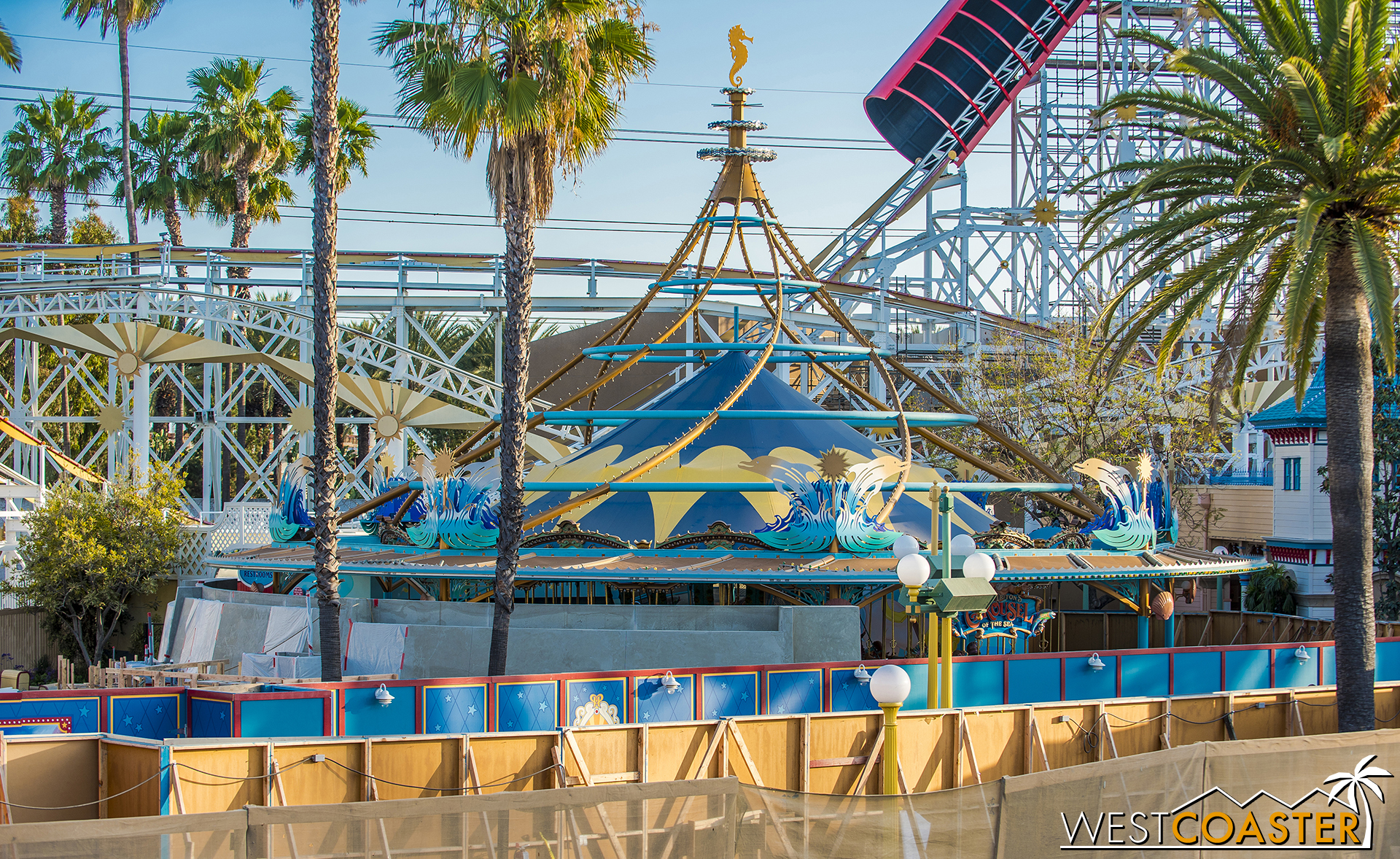  Meanwhile, the concrete wall that surrounds Jessie’s Critter Carousel (why was this not the “Pal-A-Round??”) has been finished. 