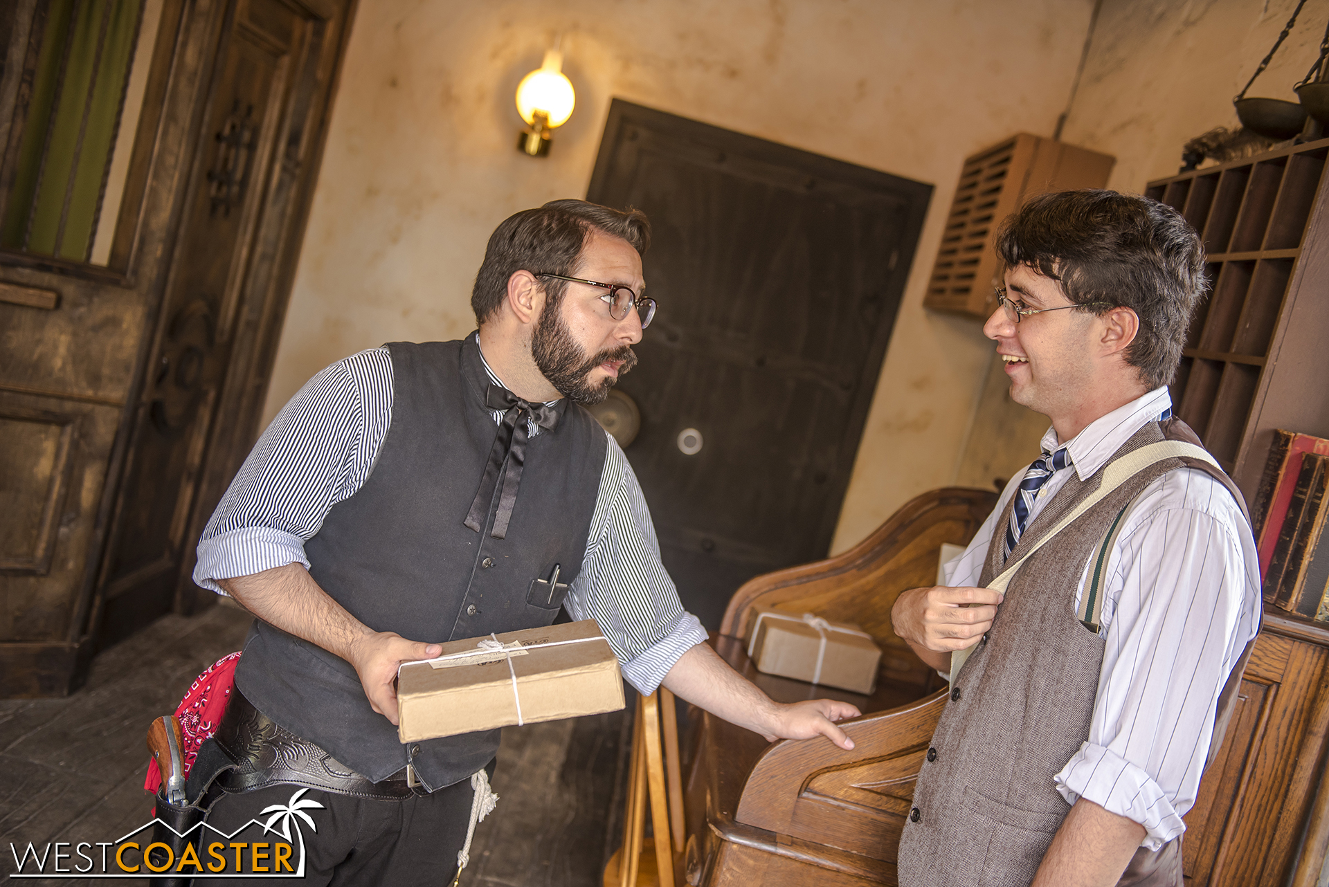 Bank guard Antonio asks a guest to deliver a package to another Citizen of Calico.