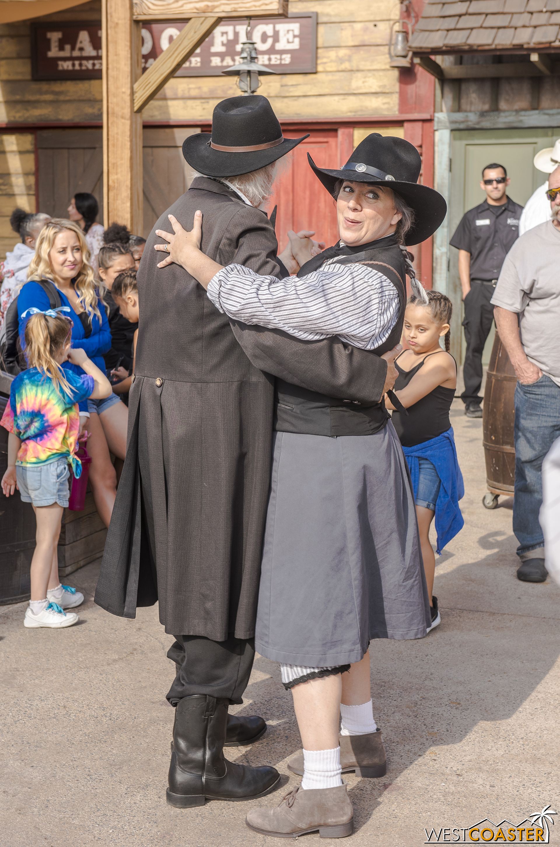 Phyllis tries to make Ox jealous by dancing with Judge Roy Bean.