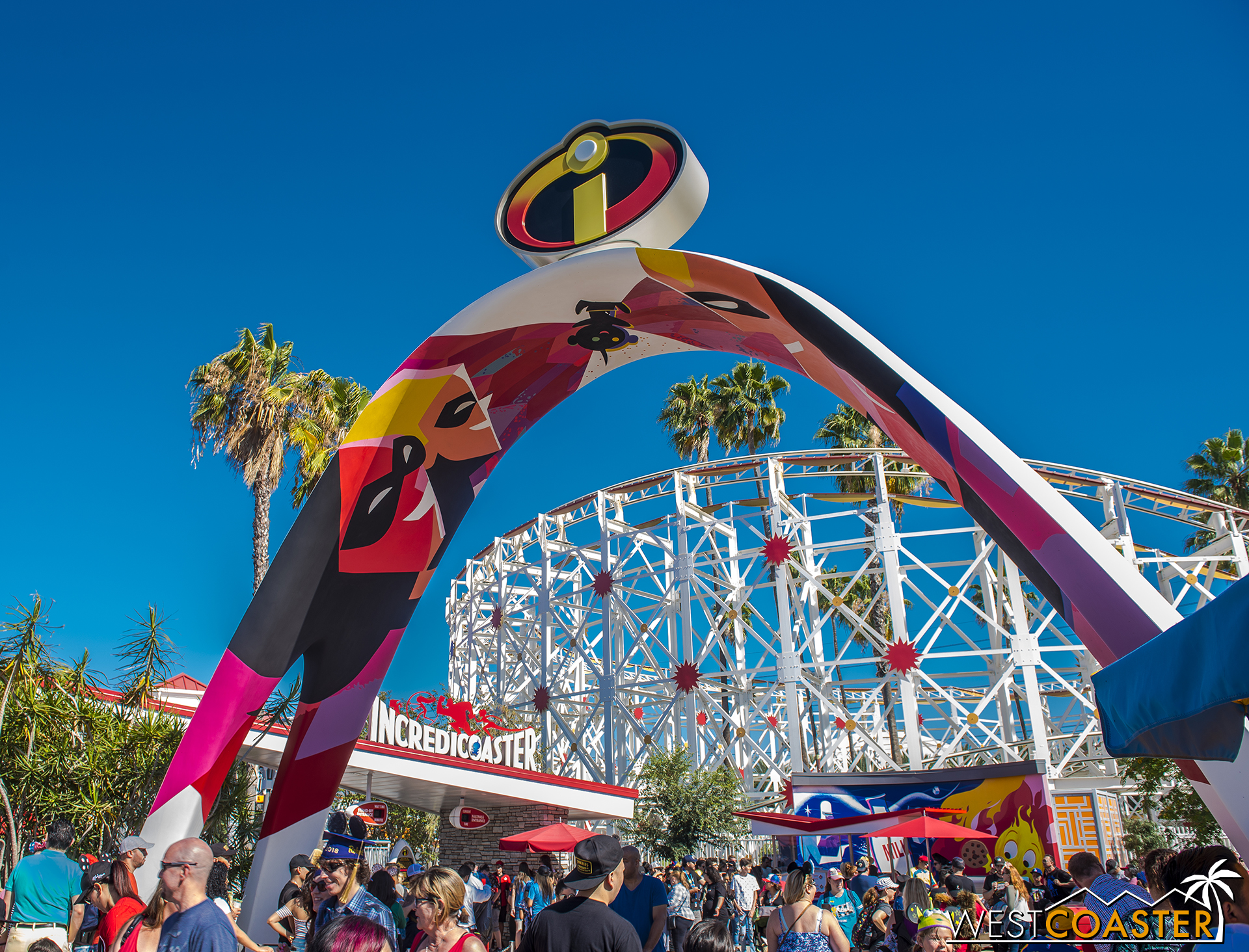  A sleek archway marks the entrance into the entry plaza for the Incredicoaster. 