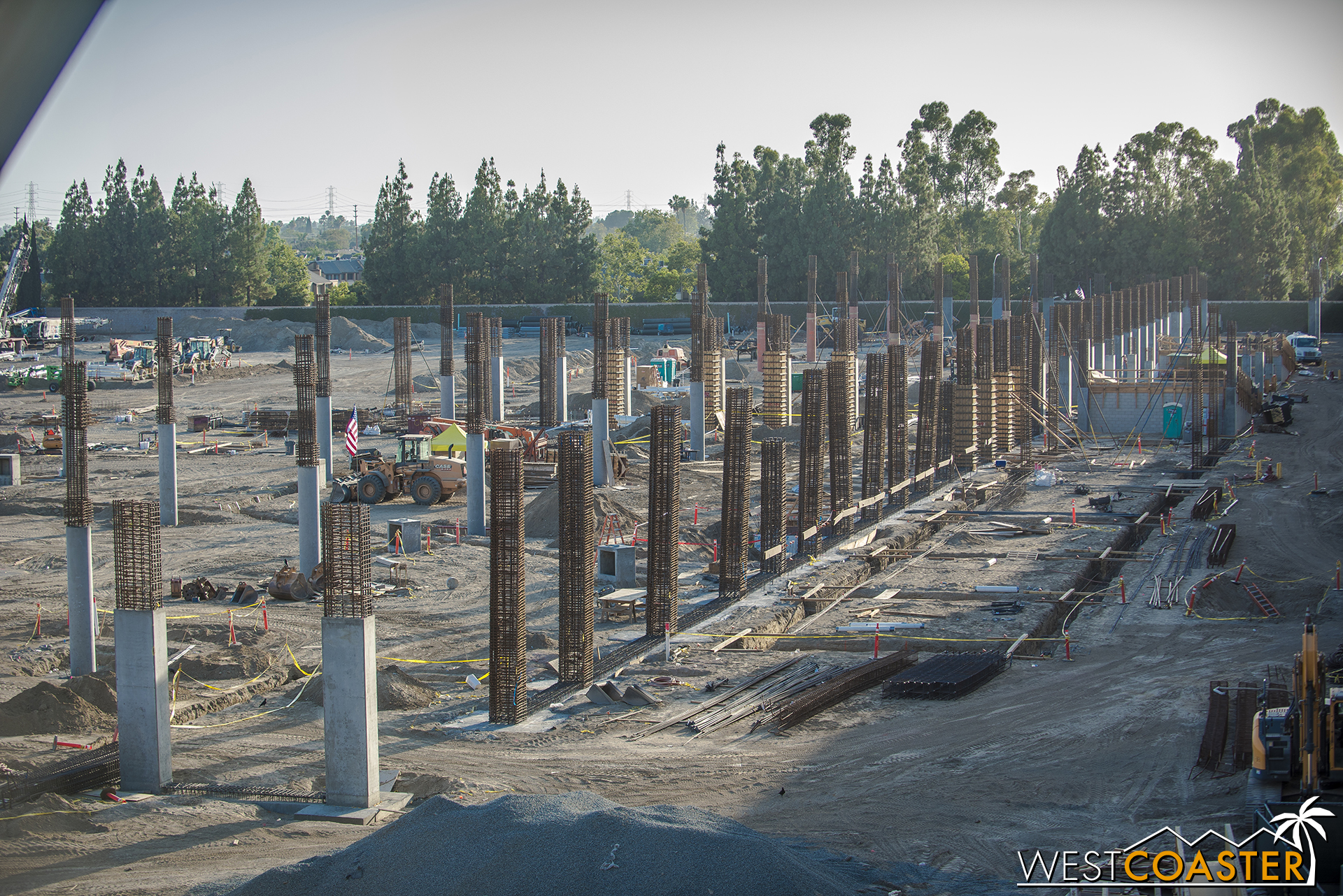  This will be the trend for a while.  Columns columns columns, and then they’ll pour the deck for the level above, then more concrete columns being formed, then more deck.  Rinse and repeat and rise up, future parking structure! 