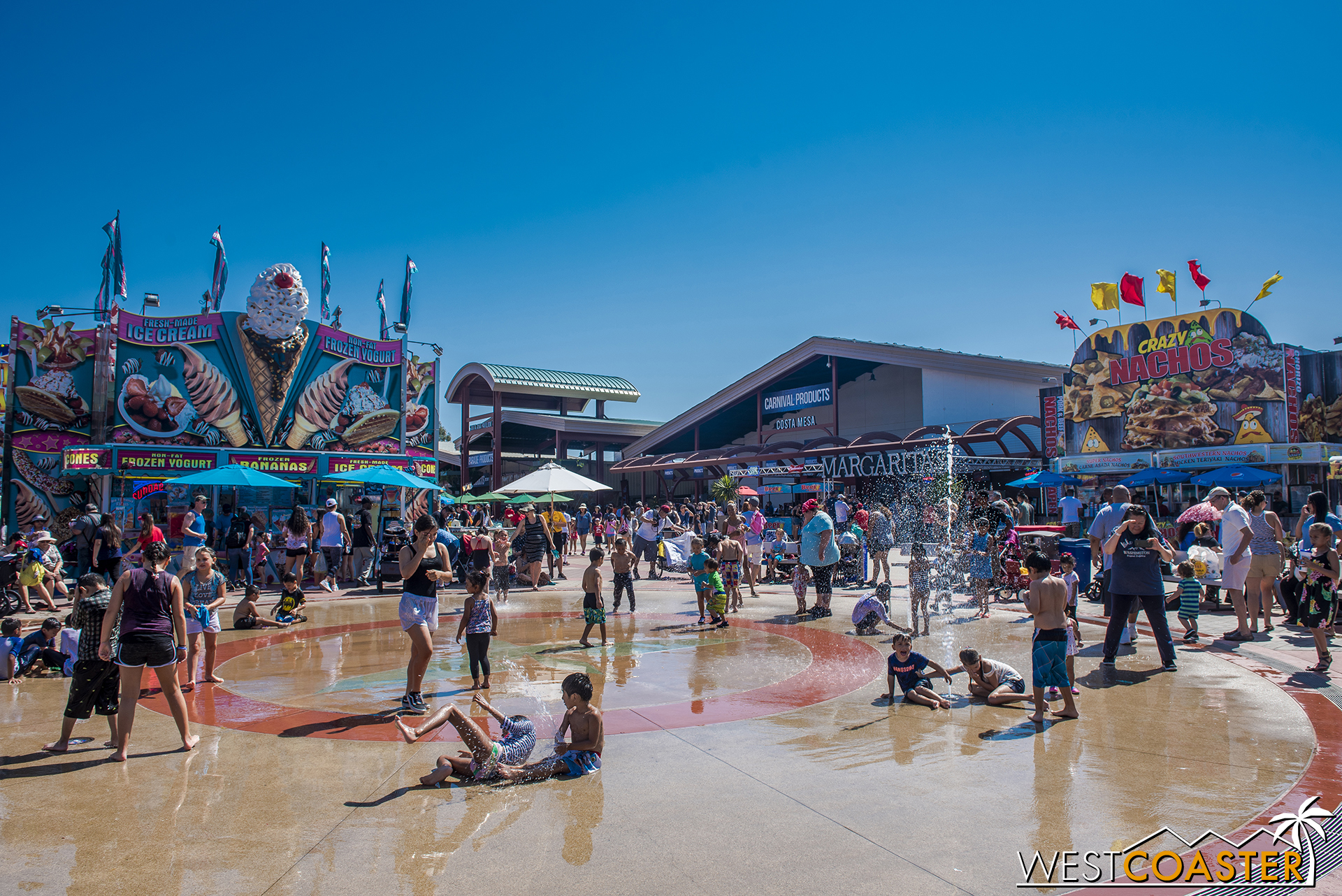  The fountain play zone in front of the Hangar is a popular spot for kids looking to beat the heat.  Germophobes may want to steer clear of the area, though. 