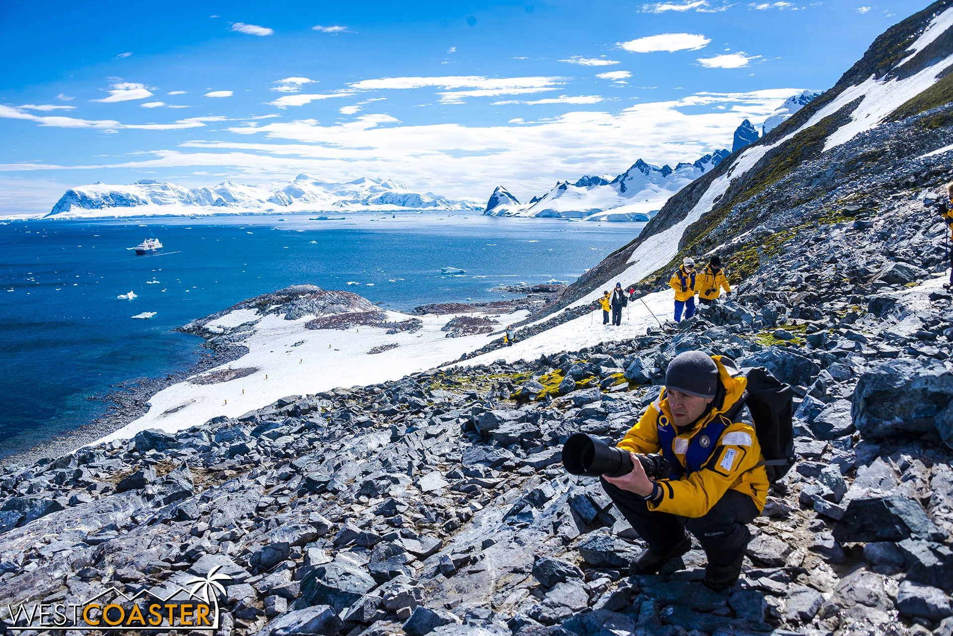 Another Quark Expedition guest prepares for a photo of the wildlife.