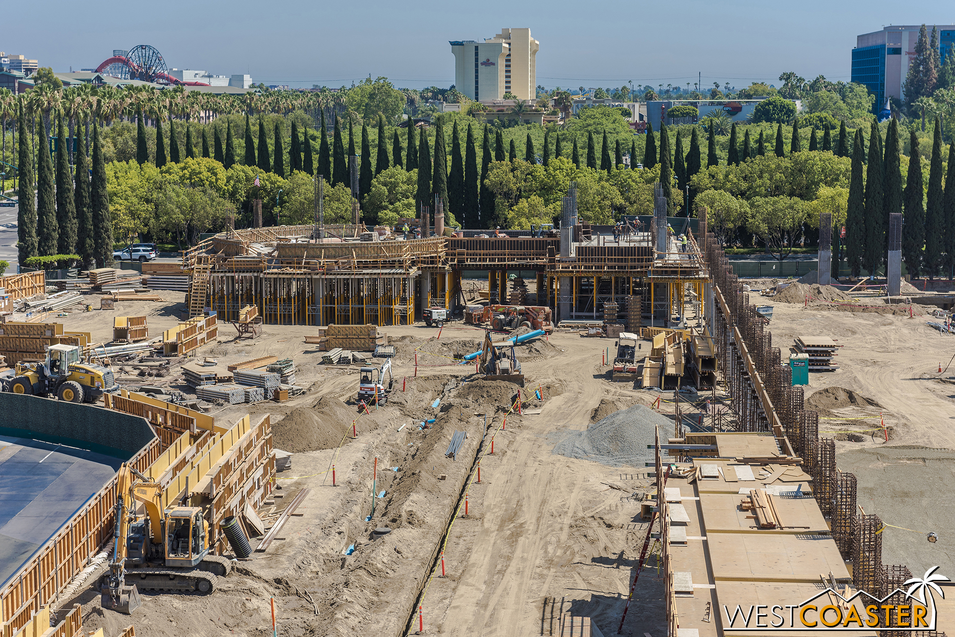 At the southeast corner of the site, the escalators will reach down toward the loading promenade.