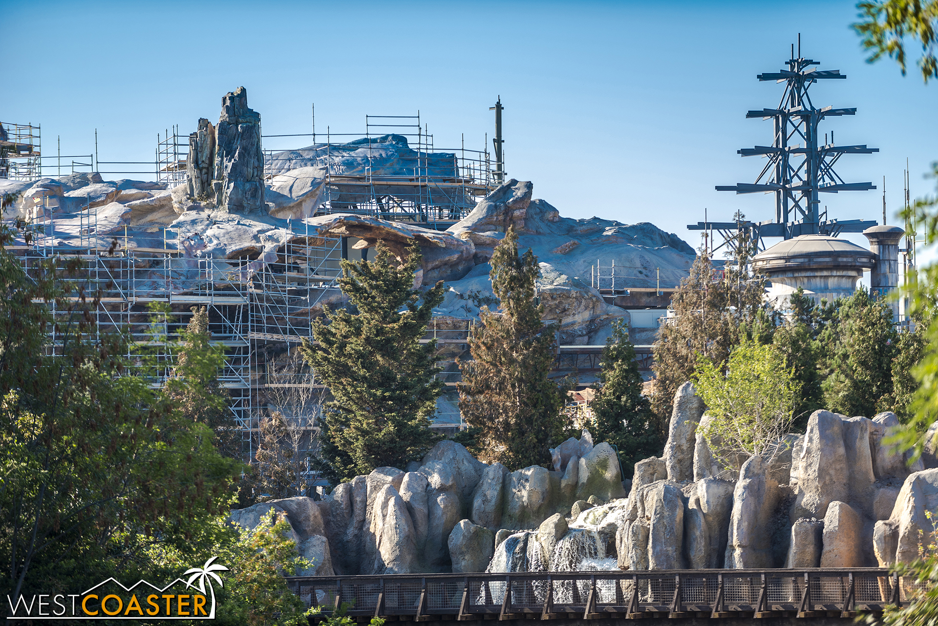  Some of the First Order structures can be seen over the trees, though.  Not sure I quite like that, as it breaks the Frontierland theme. 