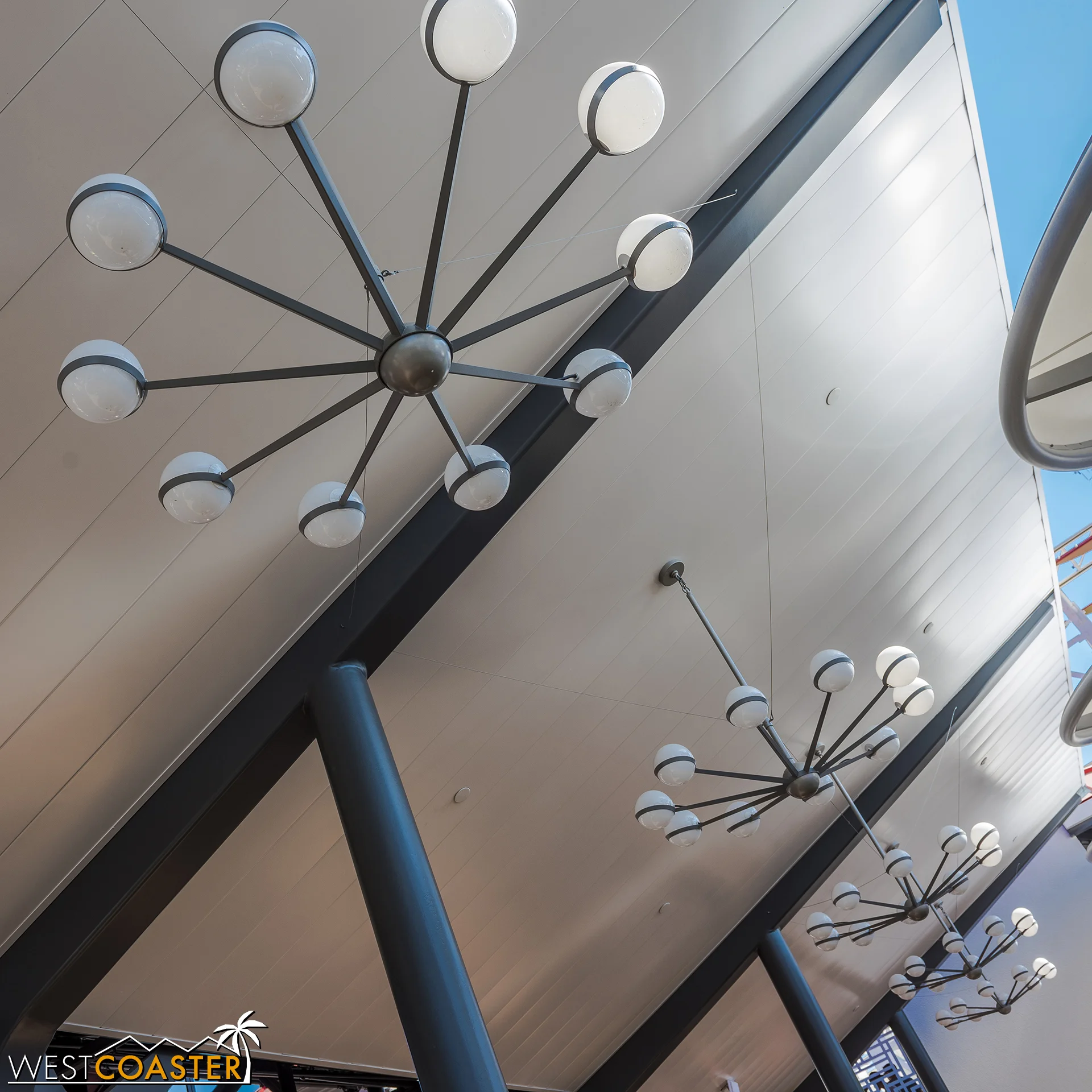 The mid-century style light fixtures look great!