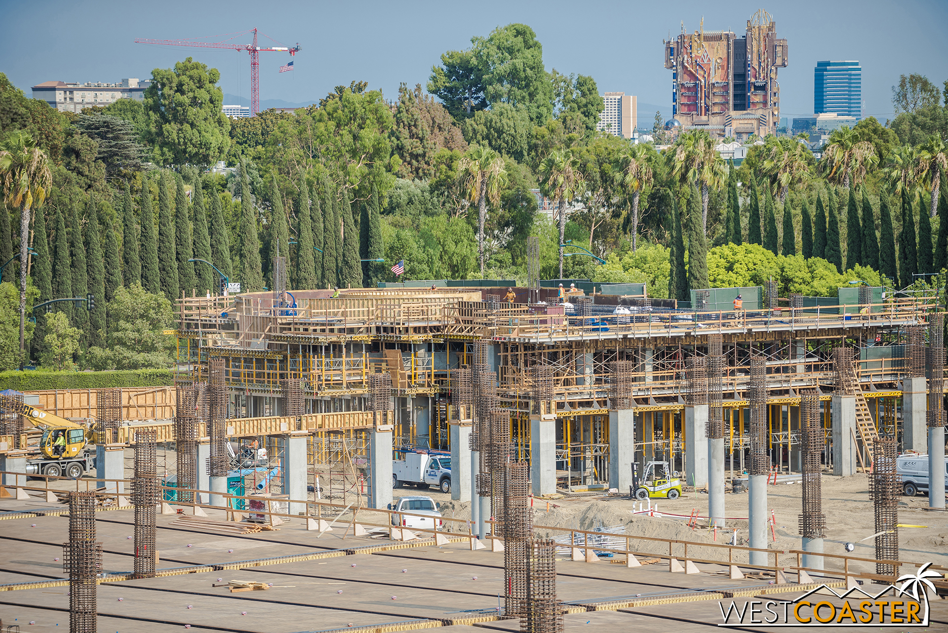  On Friday, they were working on the second floor.  By Sunday, they were lifting the rebar cage for the first column of the third level. 