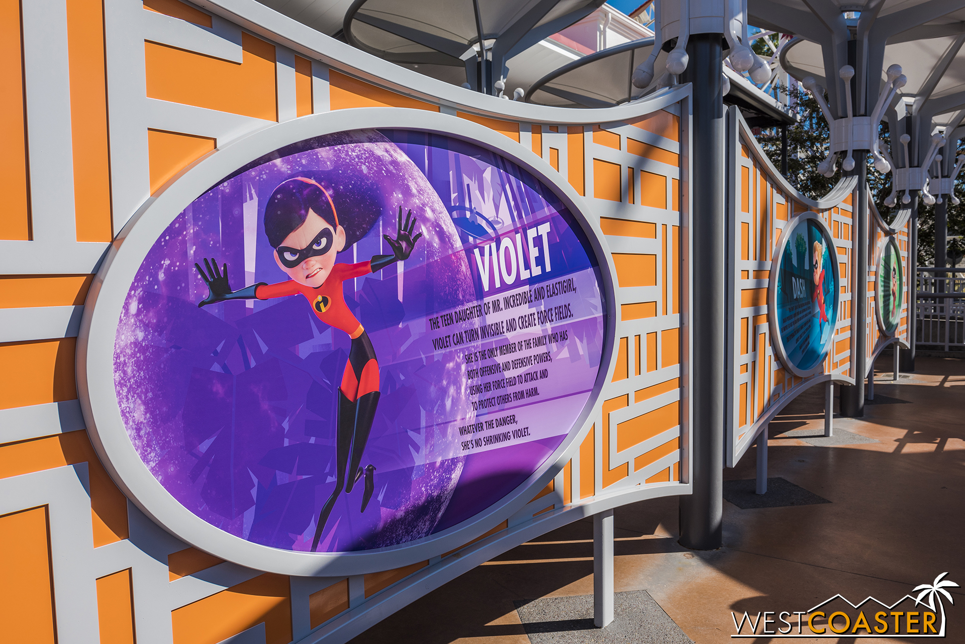  Going in the standby line for The Incredicoaster, guests can read a variety of graphics about the Incredibles. 