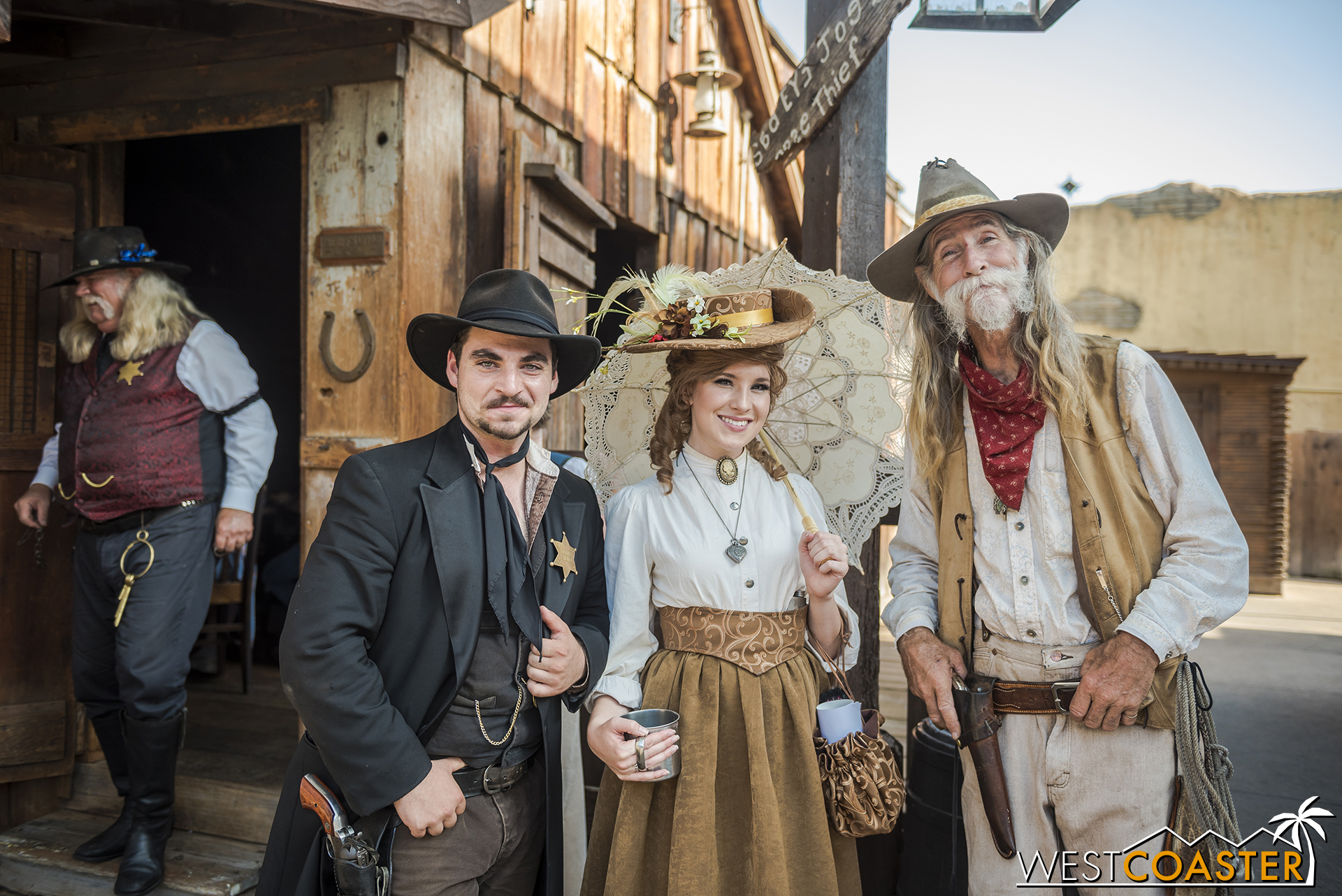  With the Mayfield Gang as a whole causing less trouble this year than usual, Deputy Luke, Goldie’s Place manager, Violet Lee, and Ike Mayfield are able to pose together for a photo. 