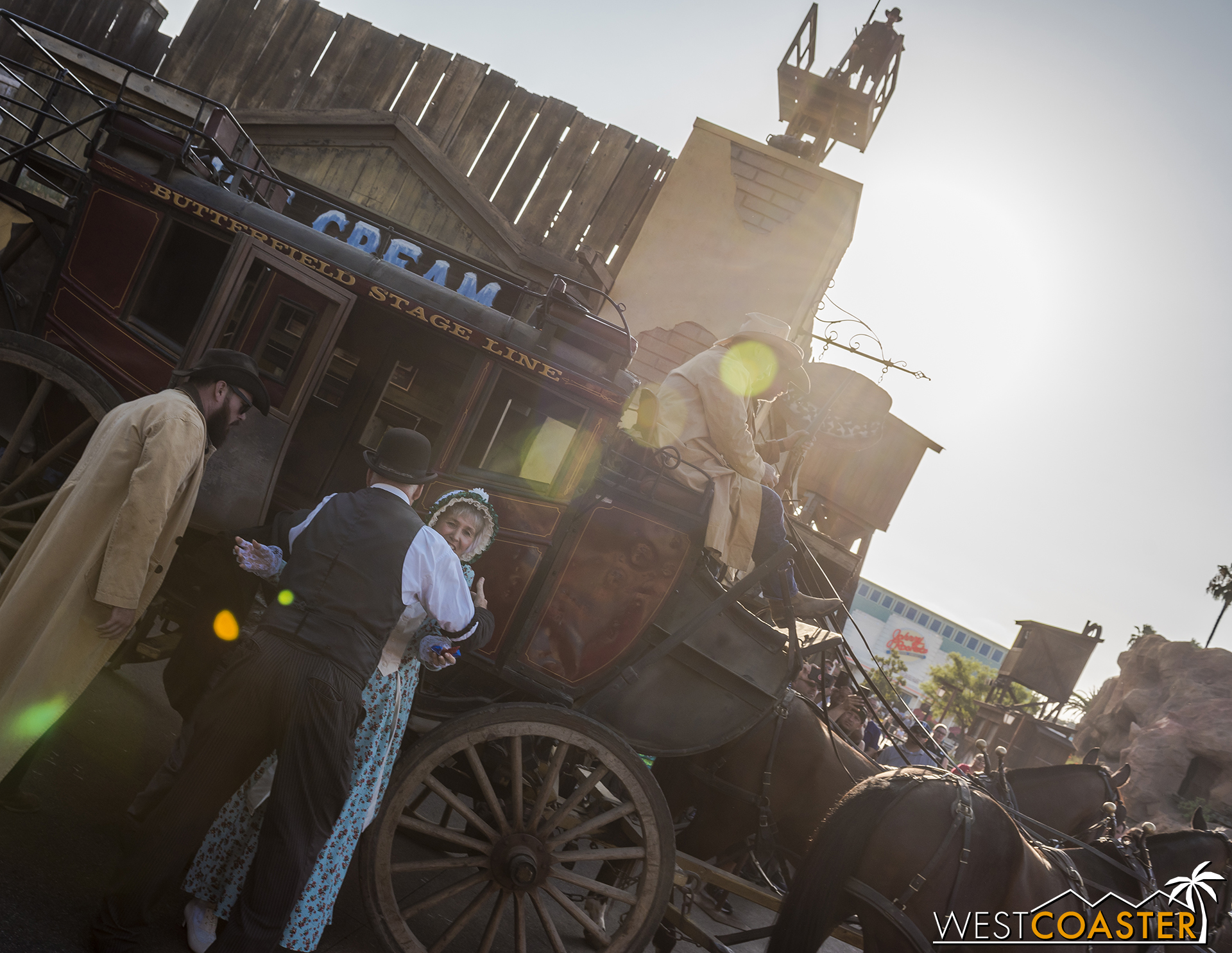 After Goldie West disembarks, Zeke embraces his wife, getting off the stagecoach. 