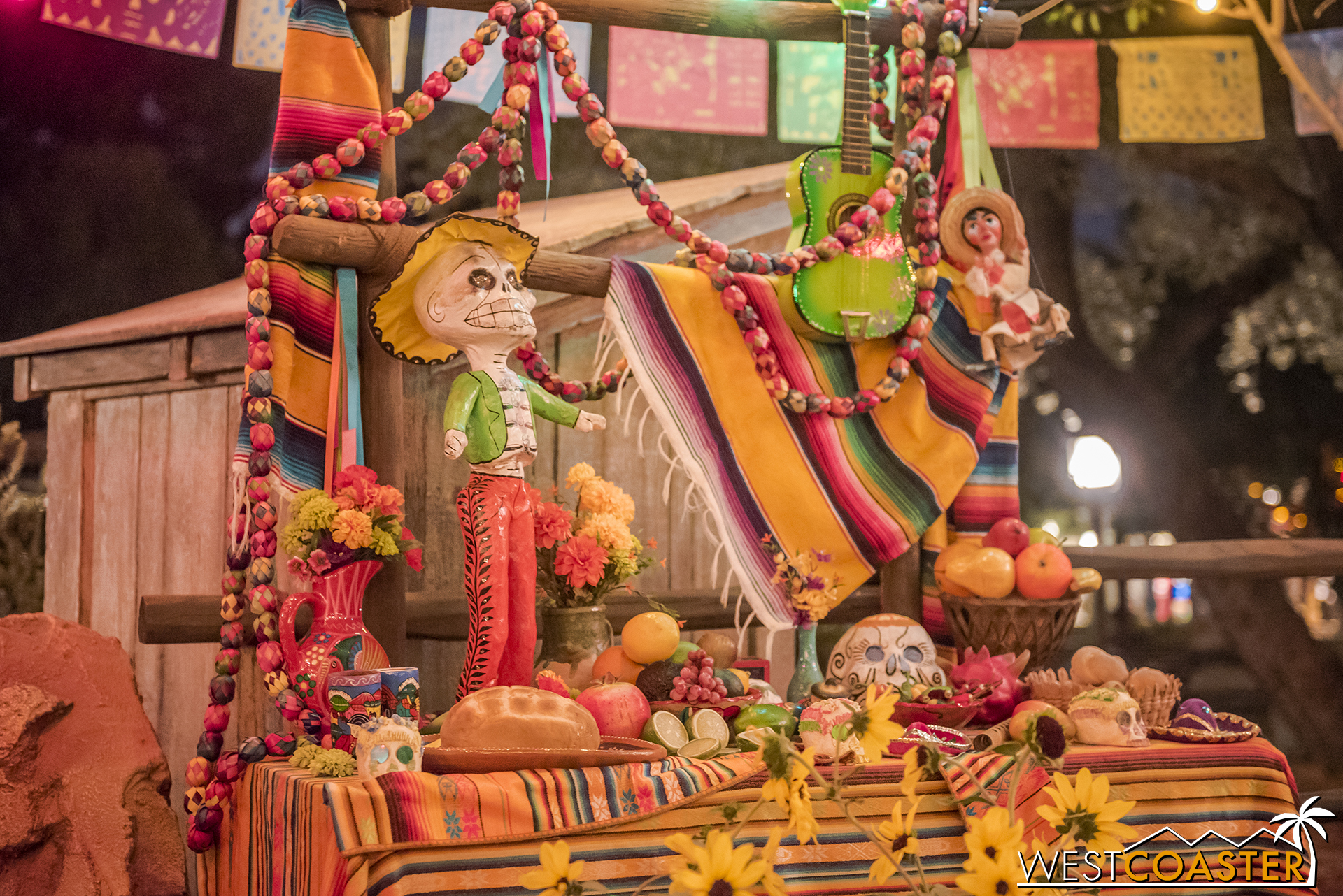  Various goodies are shown at the  ofrendas , or offerings for the dead. 