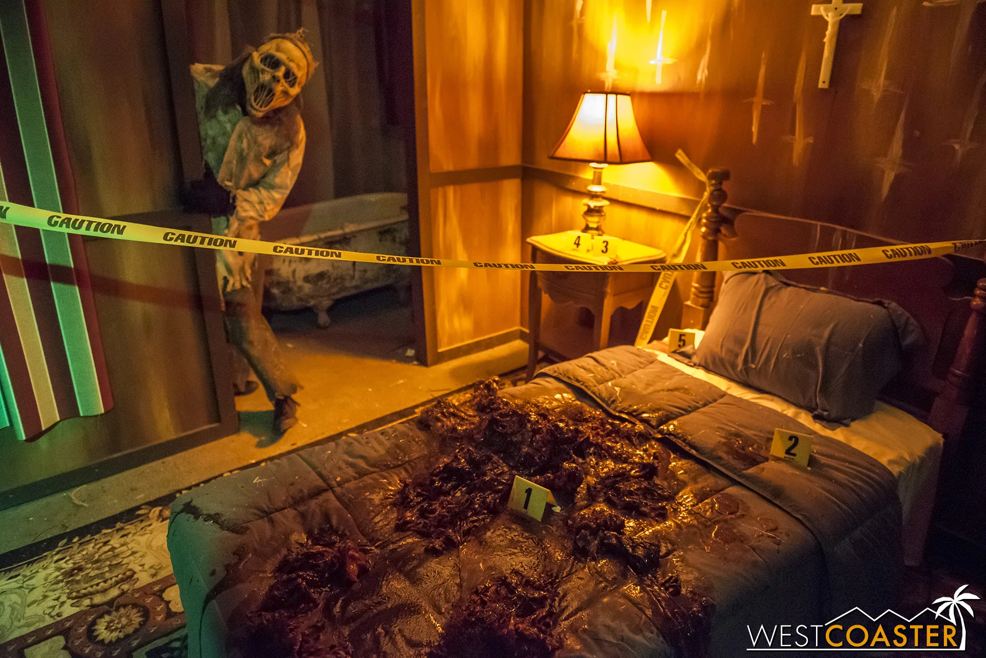 We’re talking Halloween Horror Nights level gore! And a mysterious ghostly killer.