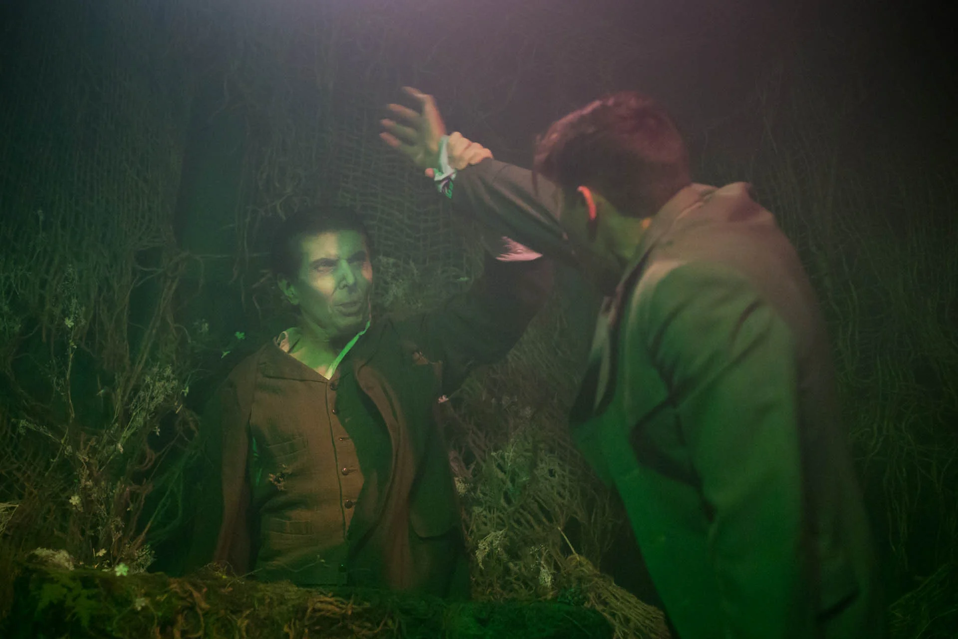 Kevin Dulude’s Corpse grabs Teig, played by Flynn Platt, in The Corpse . Photo by Daniel Kitayama and courtesy of Unbound Productions.