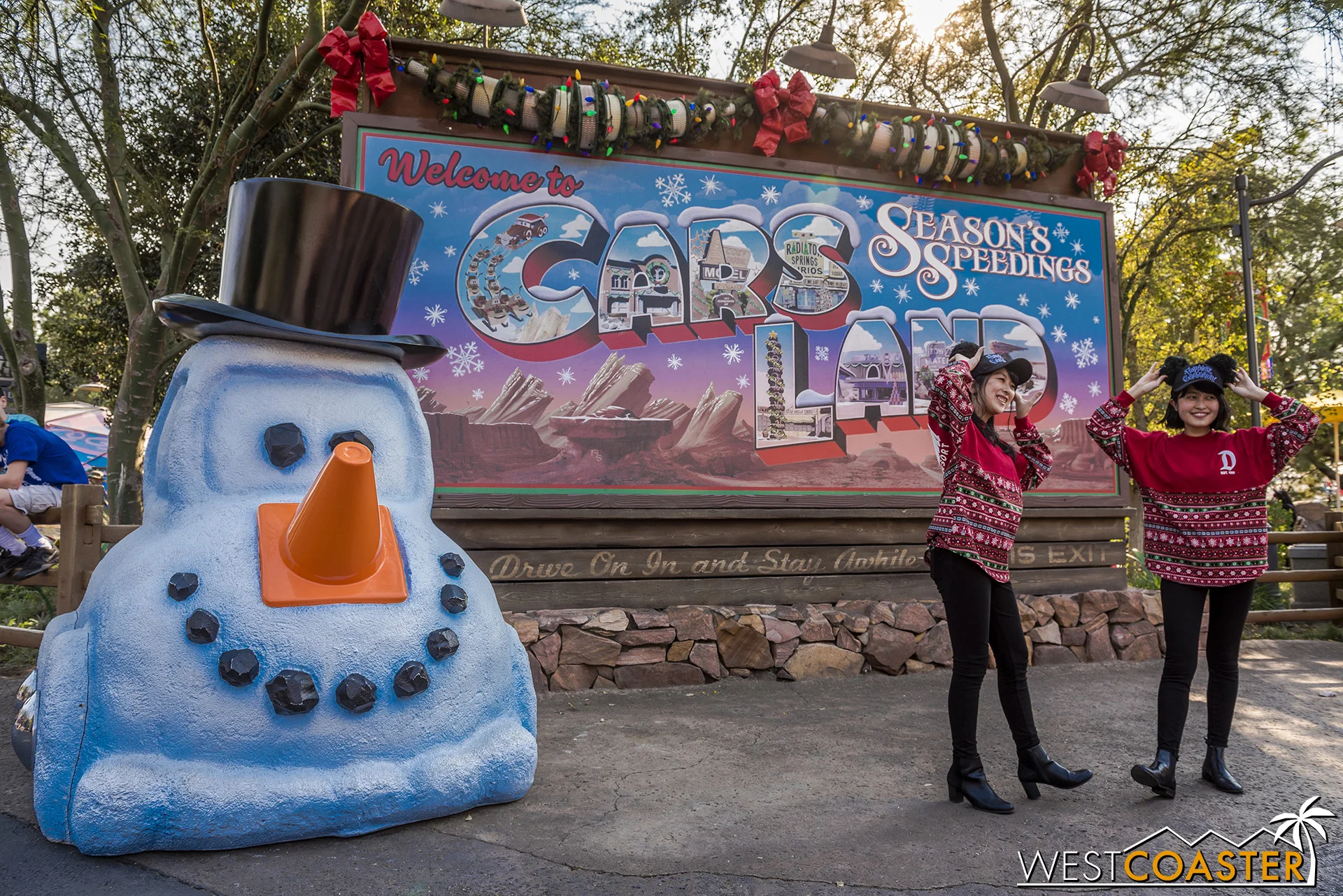 The Cars Land billboard has a seasonal overlay and is still attracting plenty of tourists.