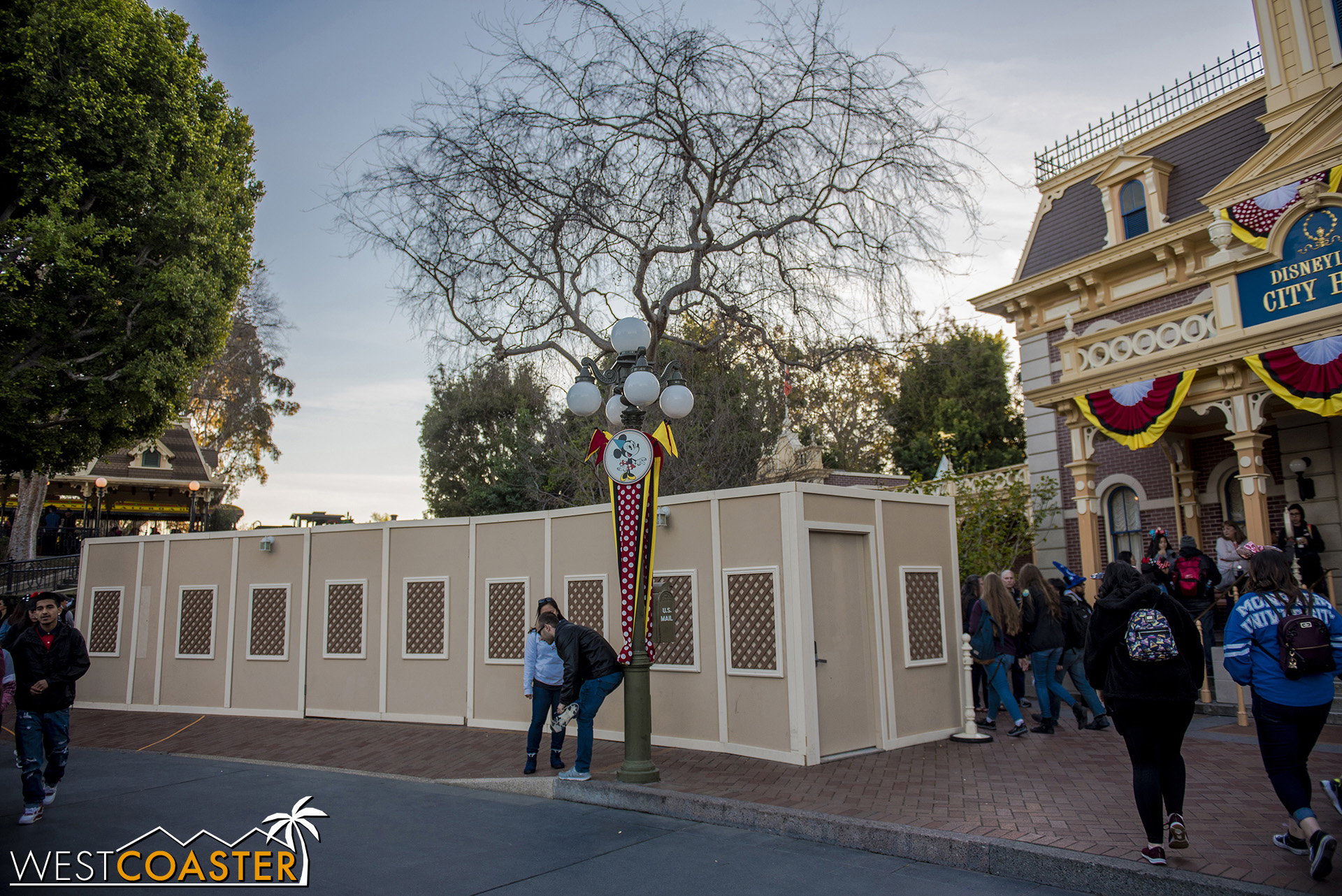  After outfitting the curb with ramp cuts at Main Street’s Town Square, they walled off the middle portion of the pavement to hide all the bodies that have perished working on “Star Wars” Land. 