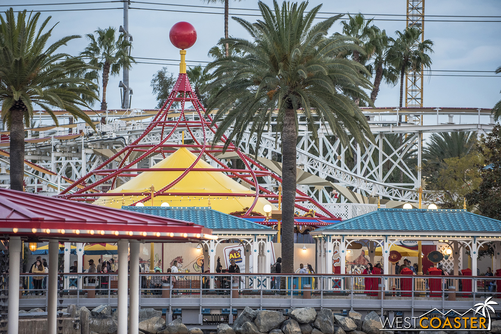  The roofs elsewhere in the Toy Story part of Pixar Pier are turquoise.  So what do they paint the top of Jessie’s Critter Carousel?  Yellow, of course.  Well, it does go better with the red. 