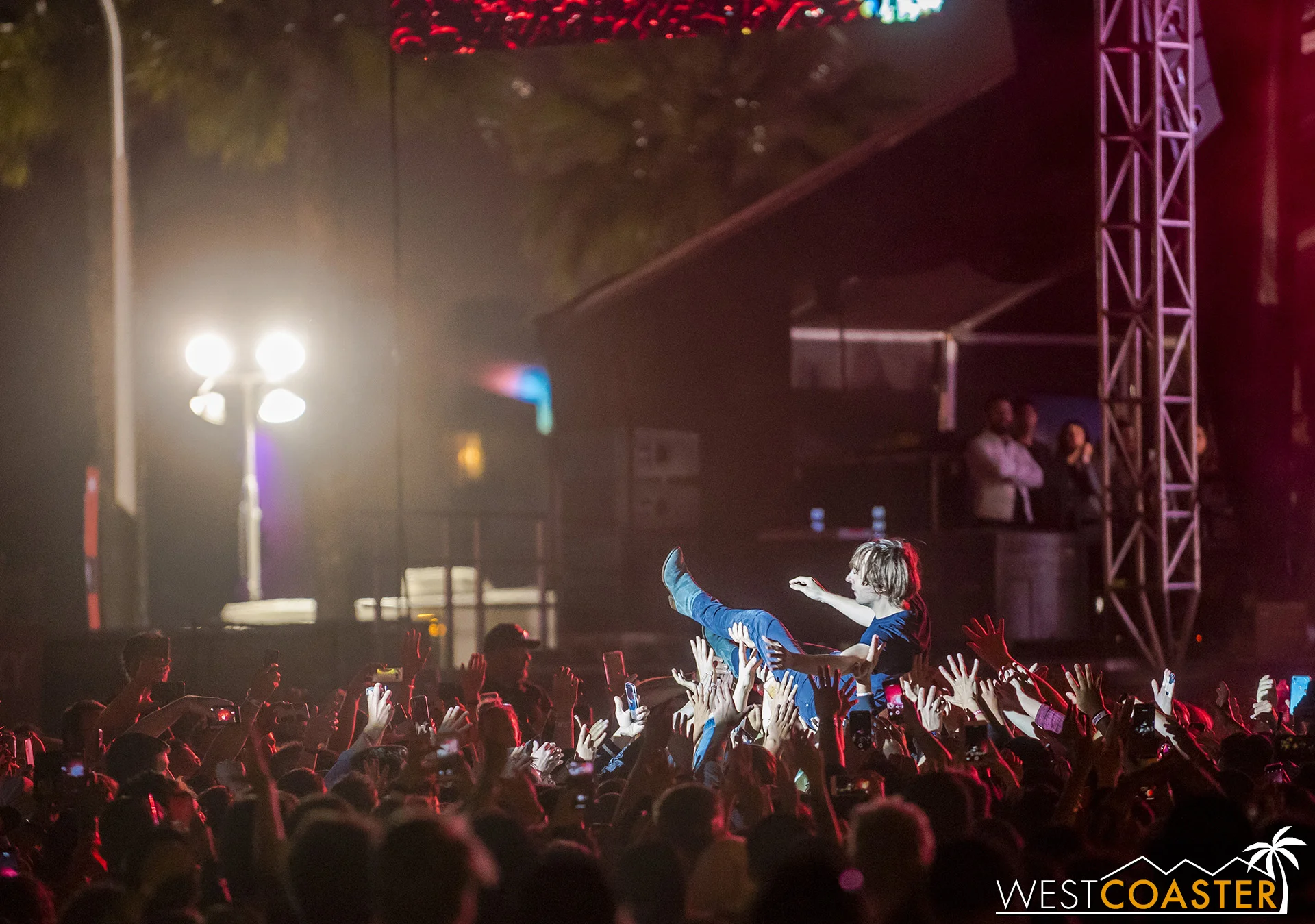 Thomas Mars rides the crowd during an encore of sorts at the end of Phoenix’s set.