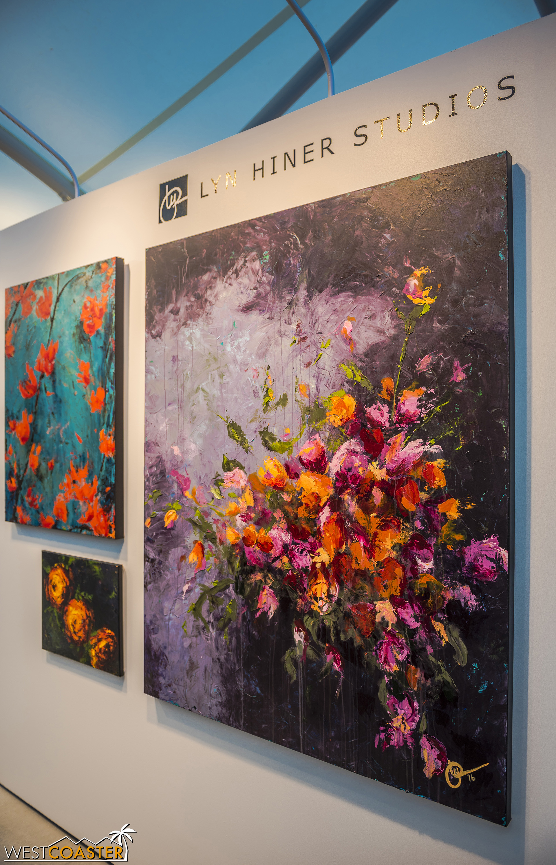  For Lyn Hiner, art was a form of healing that she pursued after being involved in a horrible burn accident.  Painting the whirling, ashen scene of fire and then overlaying with a beauty of rebirth from the flowers helped her work through the emotion