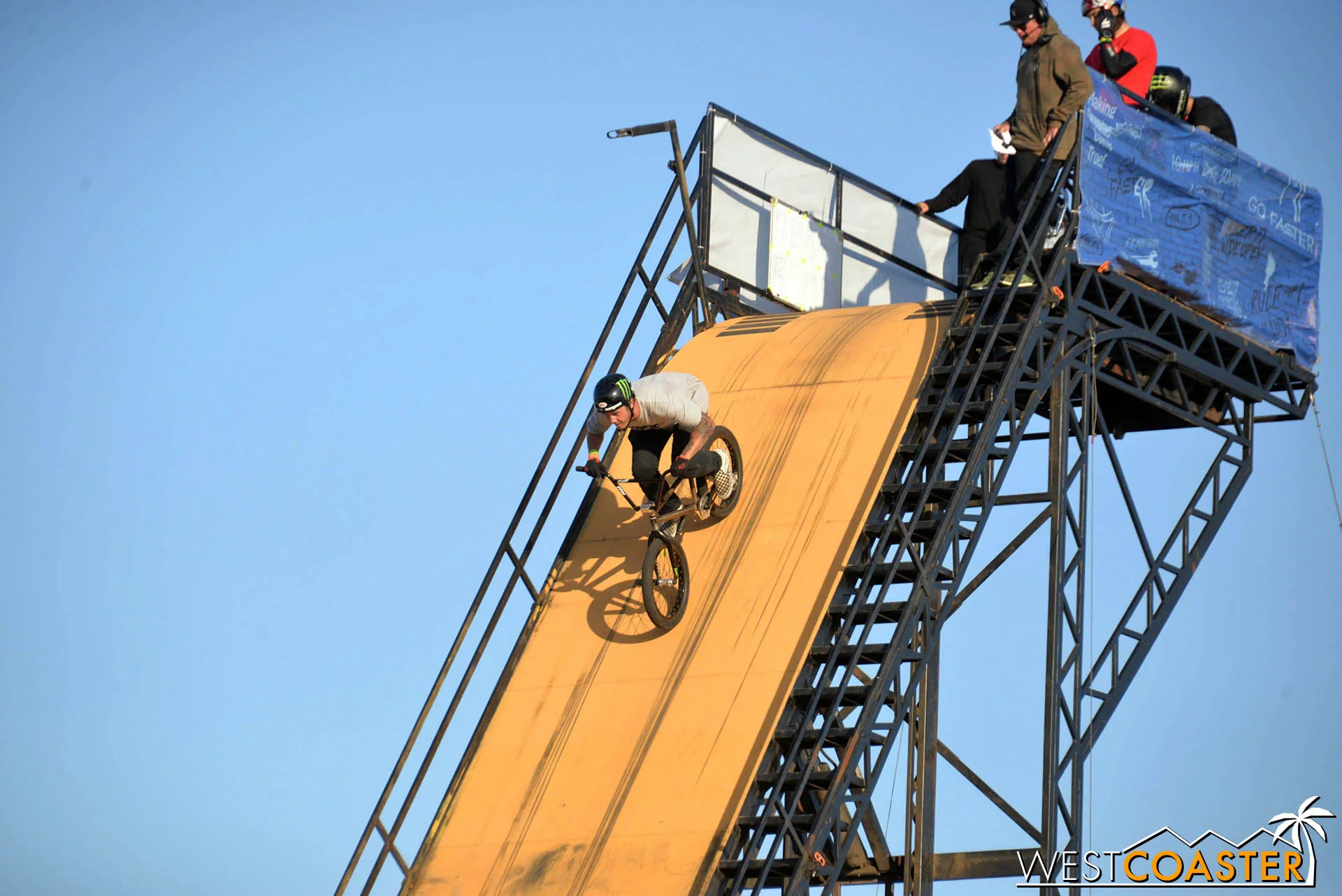 Racing down the steep drop.