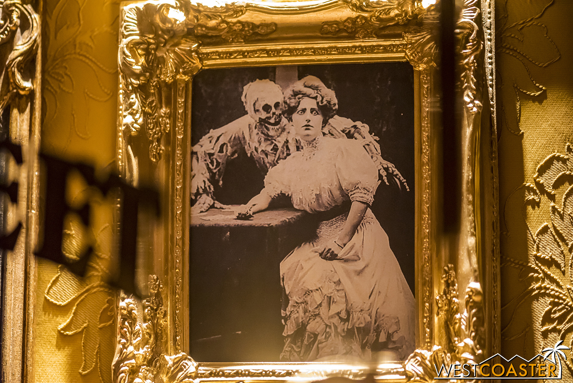  I love this macabre phantom photo, located in the storefront of the Disneyland Photo store. 