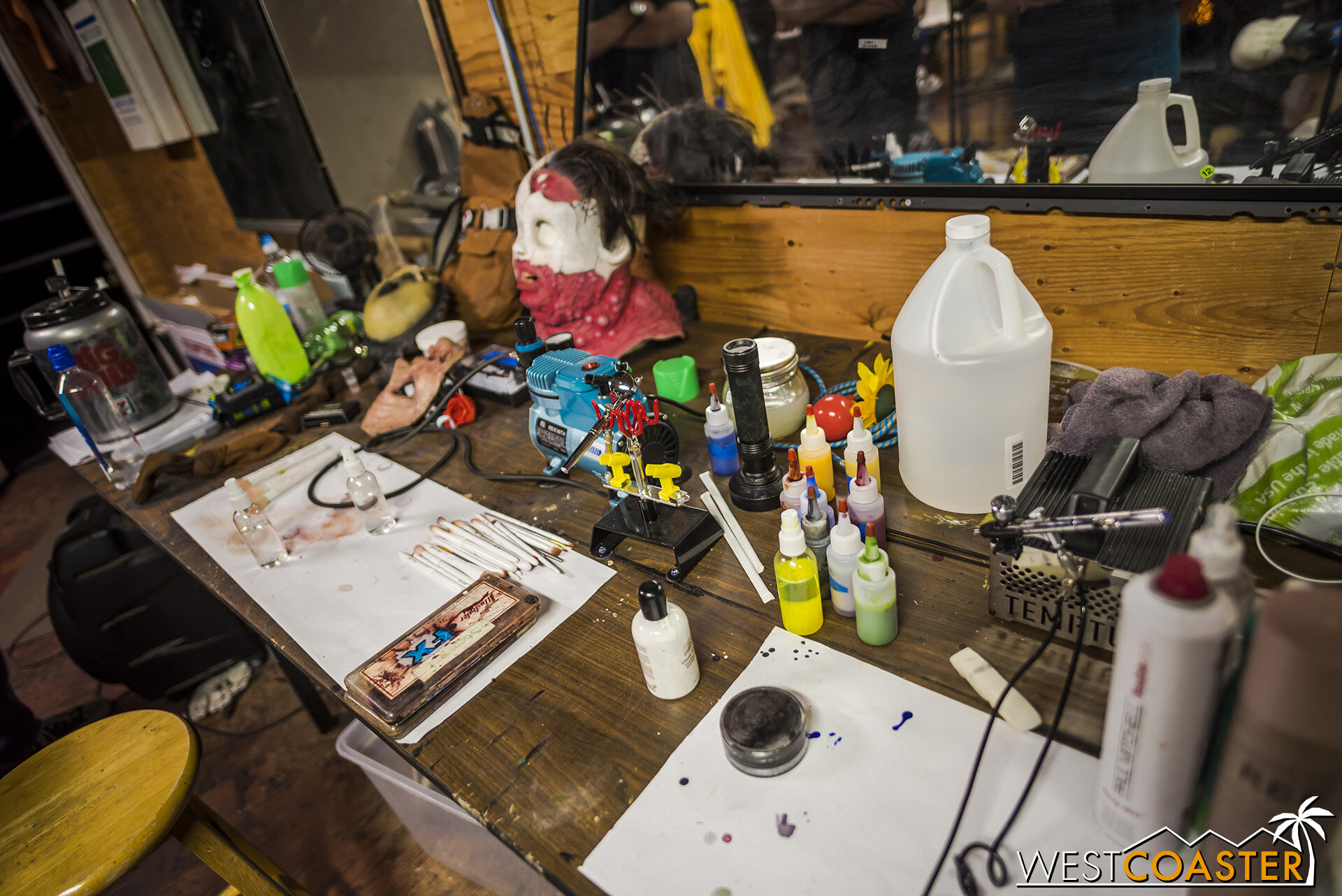  At the makeup table. 