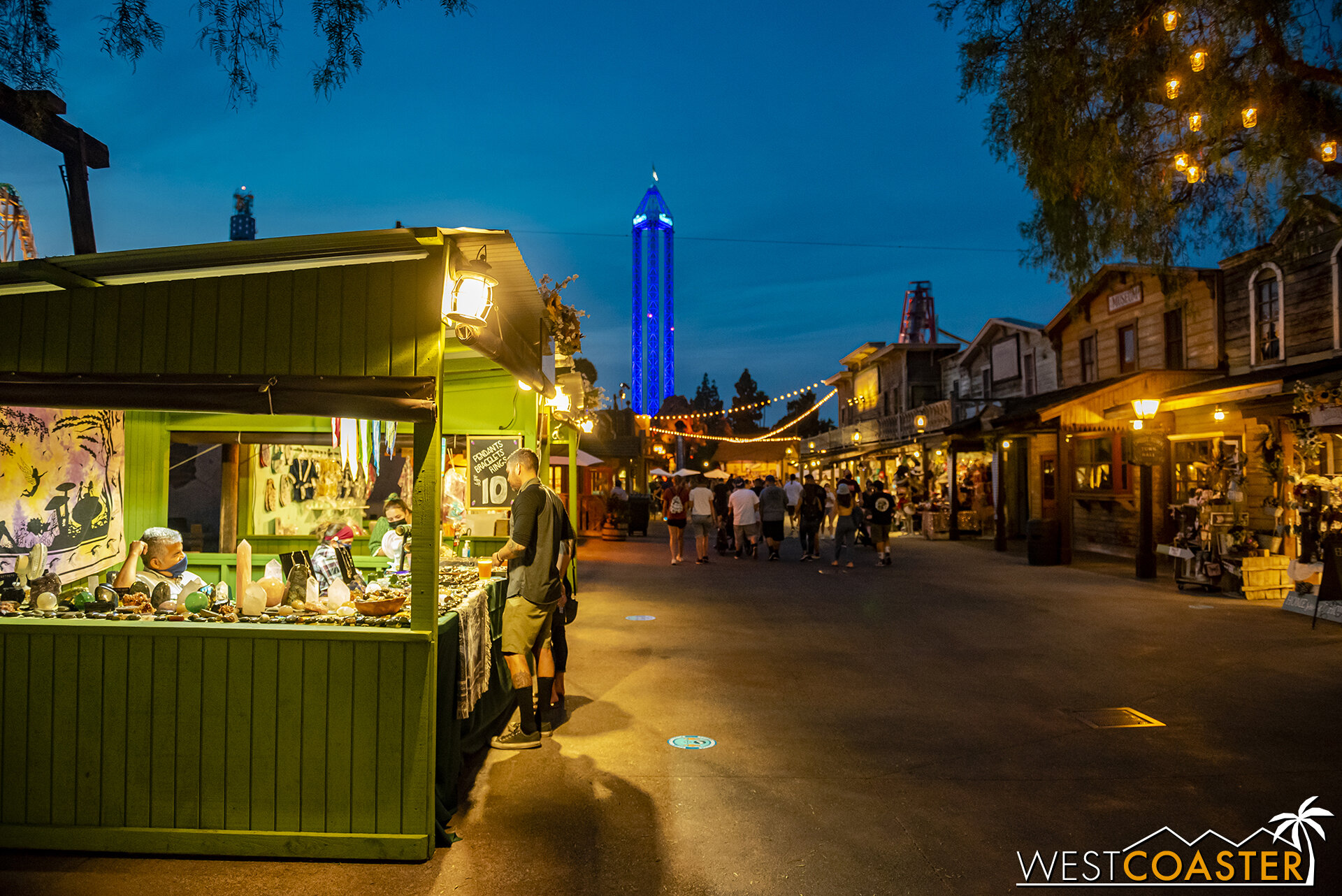  Nighttime in Ghost Town, with the boutique vendor stands still open. 