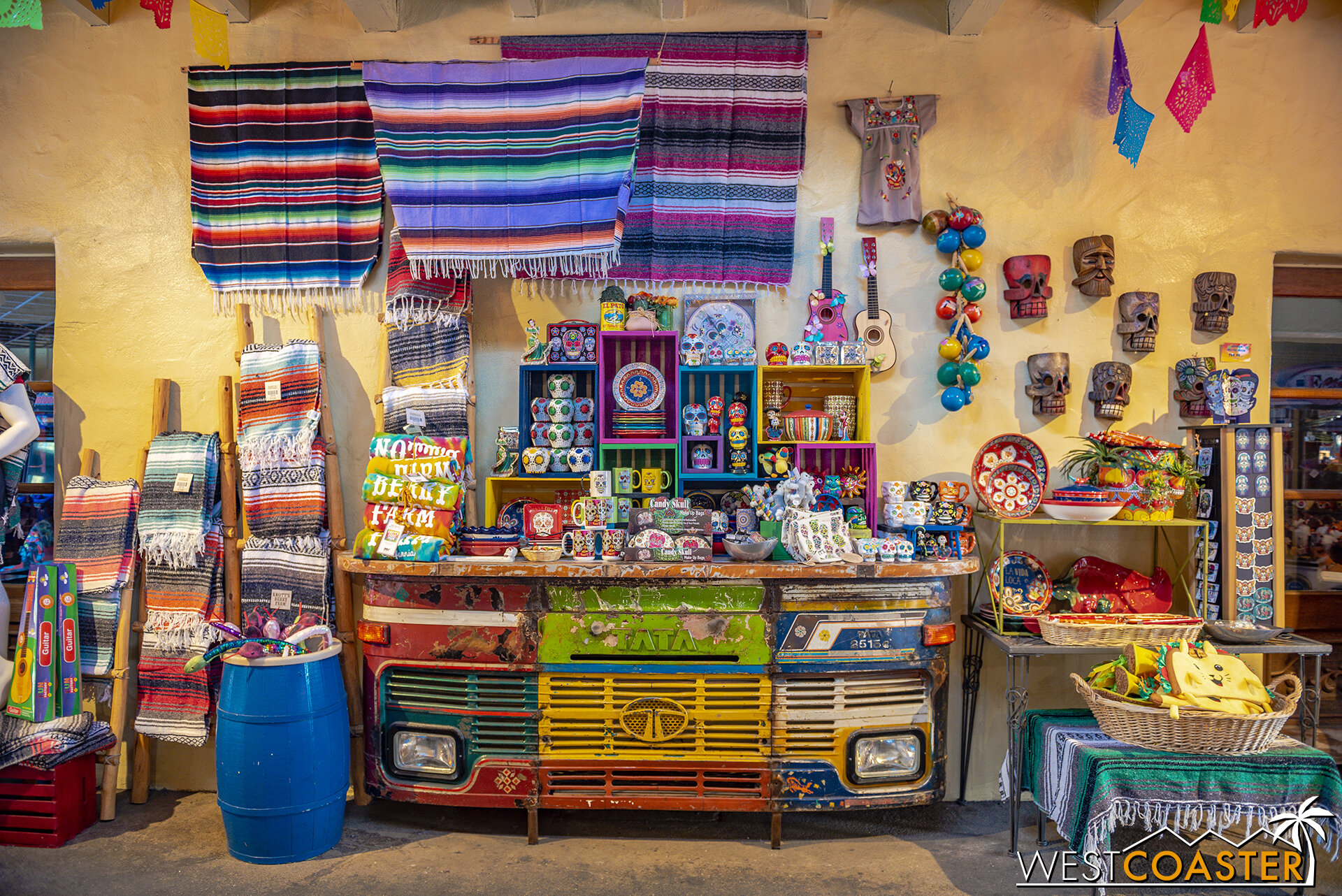  Some merchandise is also on sale at the arcade between the Fiesta Village fountain and the Stagecoach and Calico Railroad crossings. 