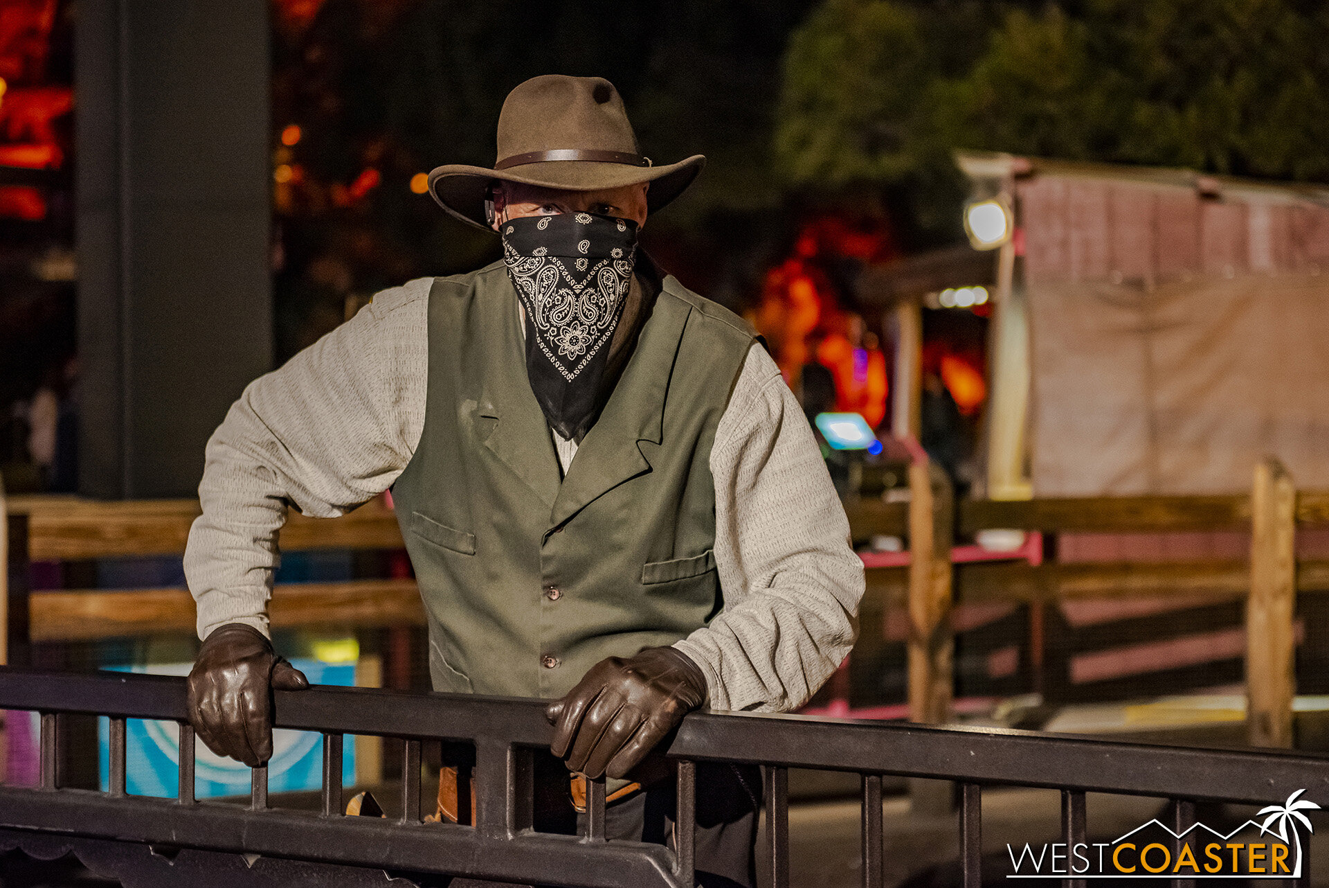  A bandit watches guests pass by the Calico Railroad. 