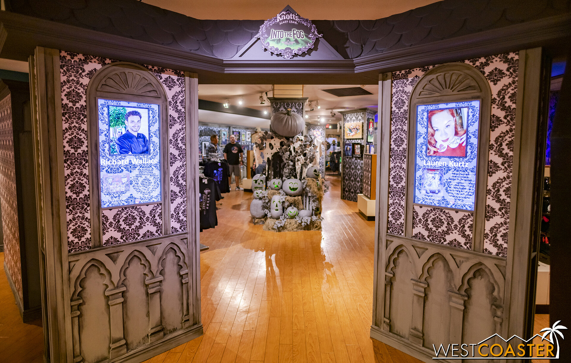  Artist bios are rotated on dual screens at the entrance portal inside the store. 