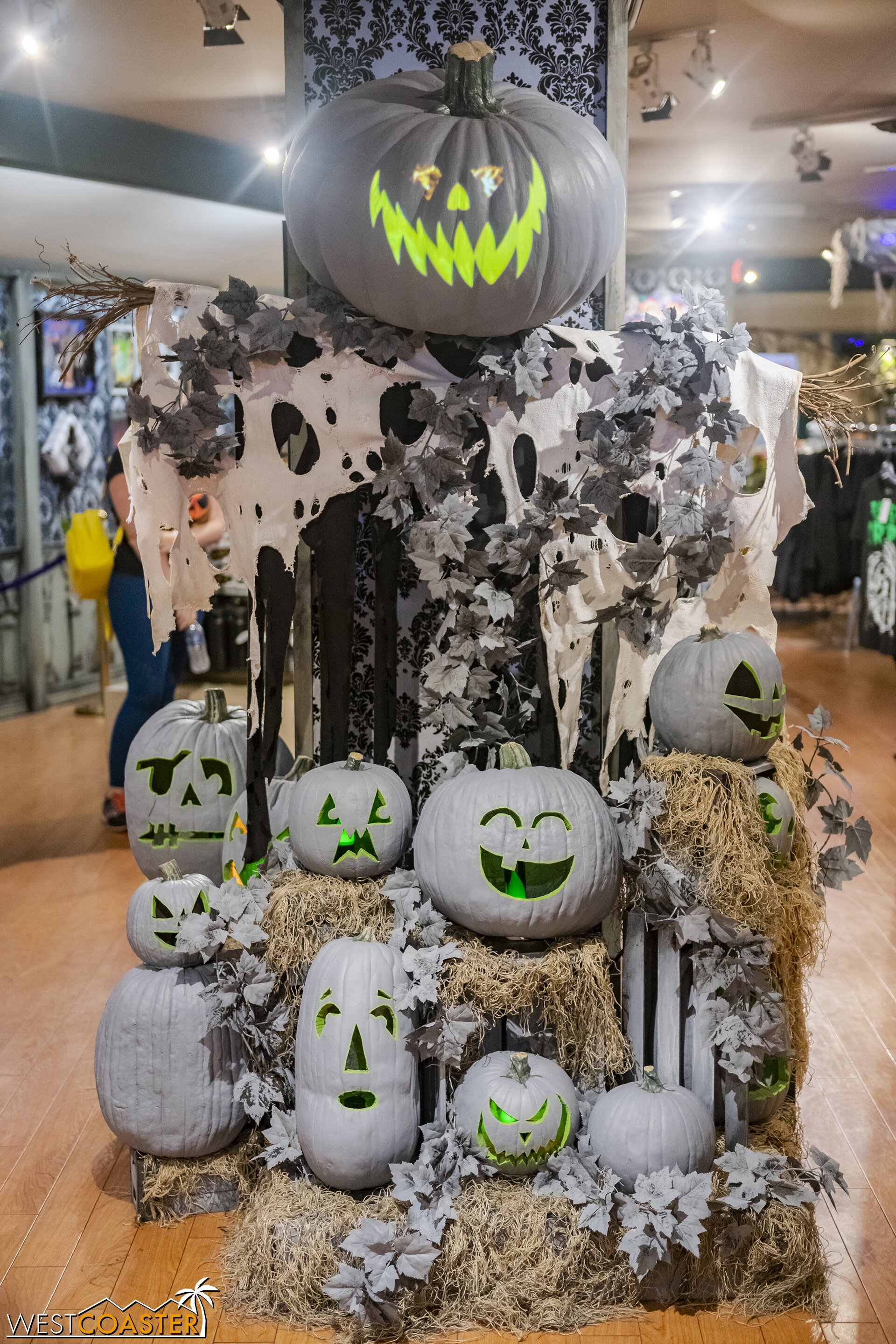  This gray and green jack-o-lantern display looks pretty neat. 