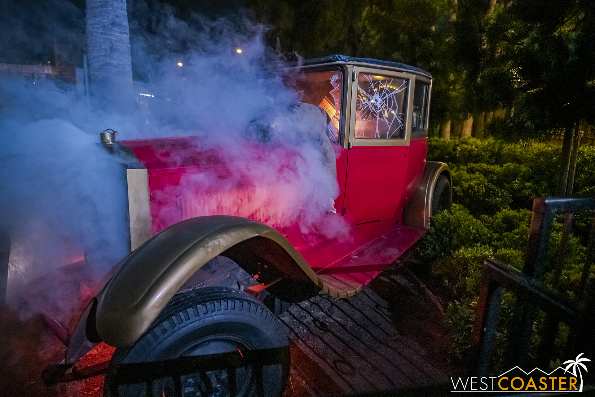  Immediately upon passing the Calico Railroad tracks, we encountered a classic red coach car crashed at a railing, with smoke (or fog) billowing from the accident scene.   