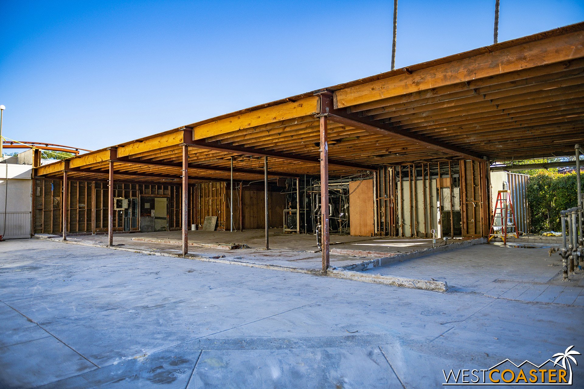  Peeping through a large opening in the construction wall reveals that the interiors has complete been gutted. 