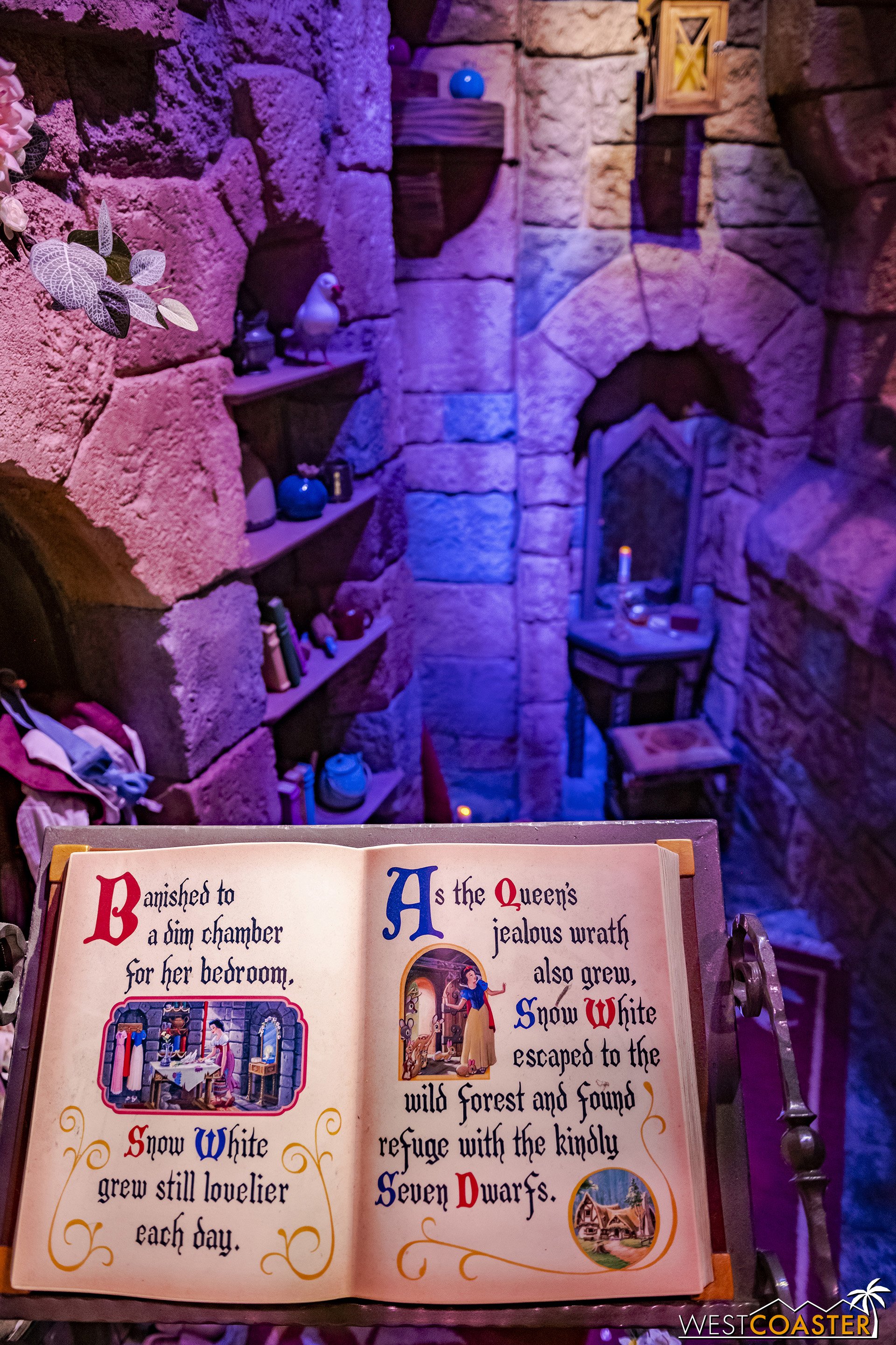  Inside, the queue scenes take on a much less ominous tone.  The chamber where Snow White was locked up is the same, but it’s been lit and presented differently. 