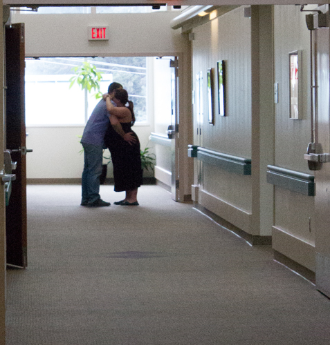 No doula in sight! Doula is not taking dad's place. We had been in the hospital room for a couple of hours and I encouraged them to get a much needed change of scenery and sunshine. Labor really picked up after they walked some laps together in the hallway.