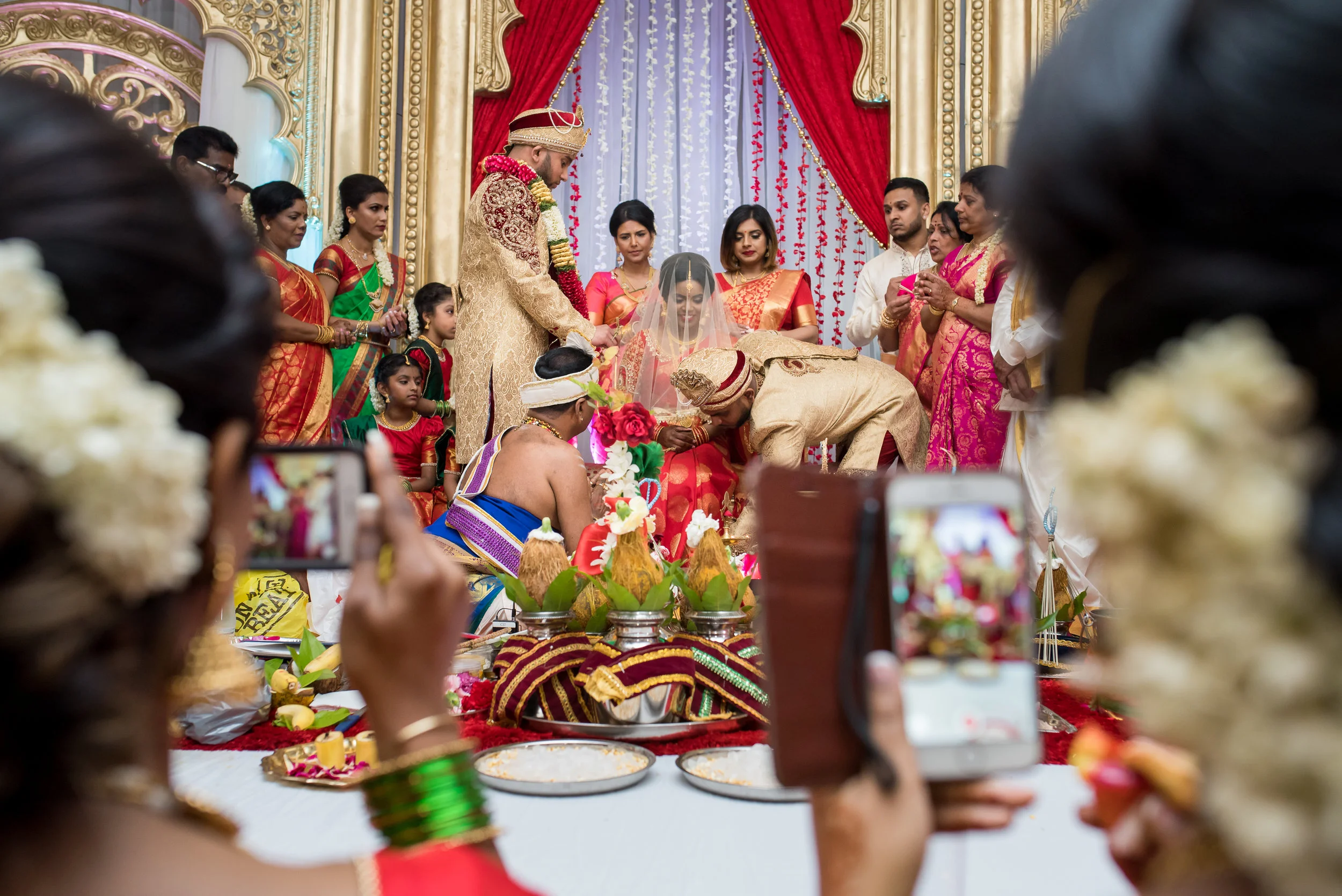 Be a responsible loved one! If you must snap the Thaali moment, keep it off the stage <3