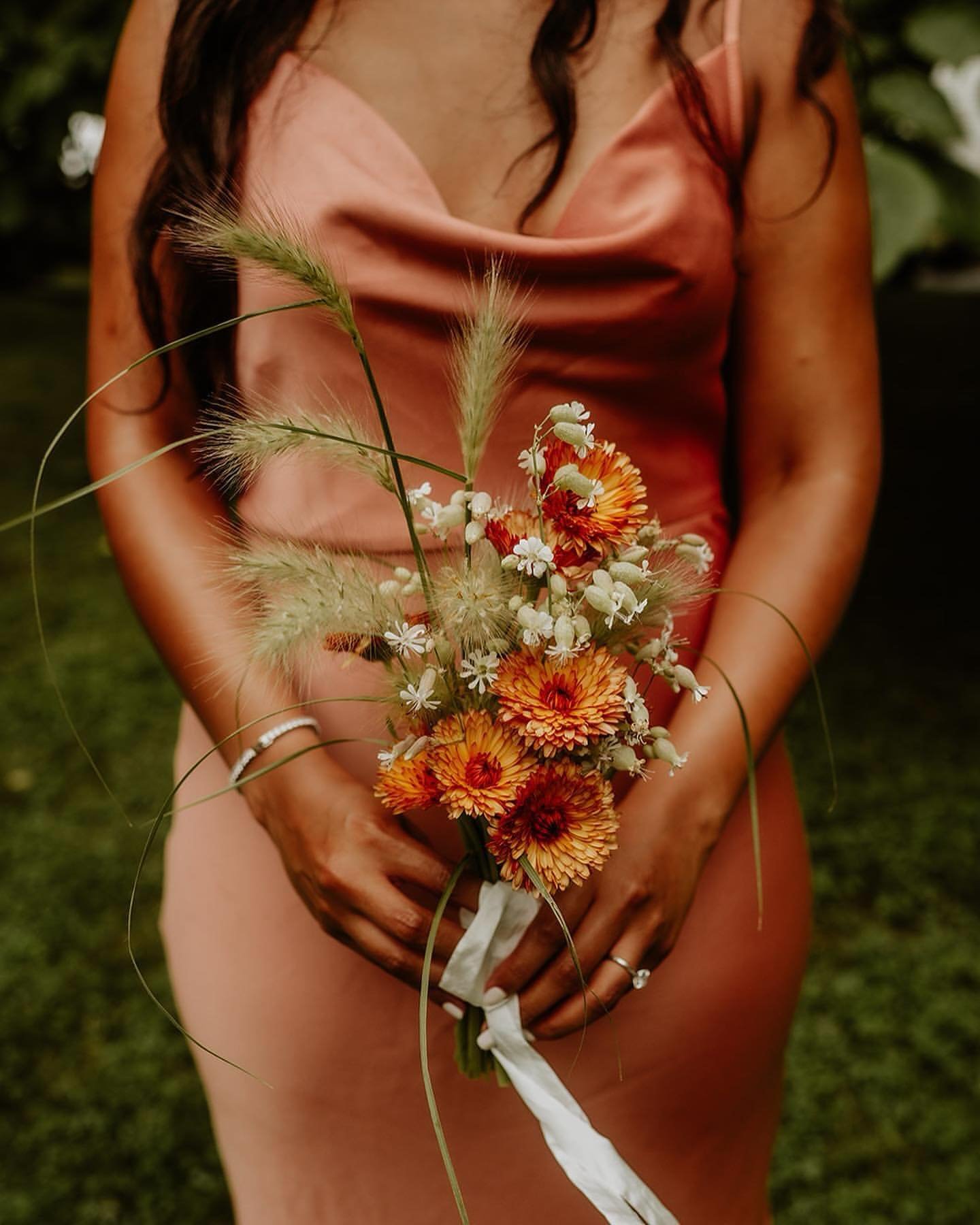 April showers bring May flowers! And in April we celebrate some of the amazing florists who bring your wedding inspiration to life! We just love it when the florals bring in wild and rustic elements that remind us of the farm and barn. Like these whi