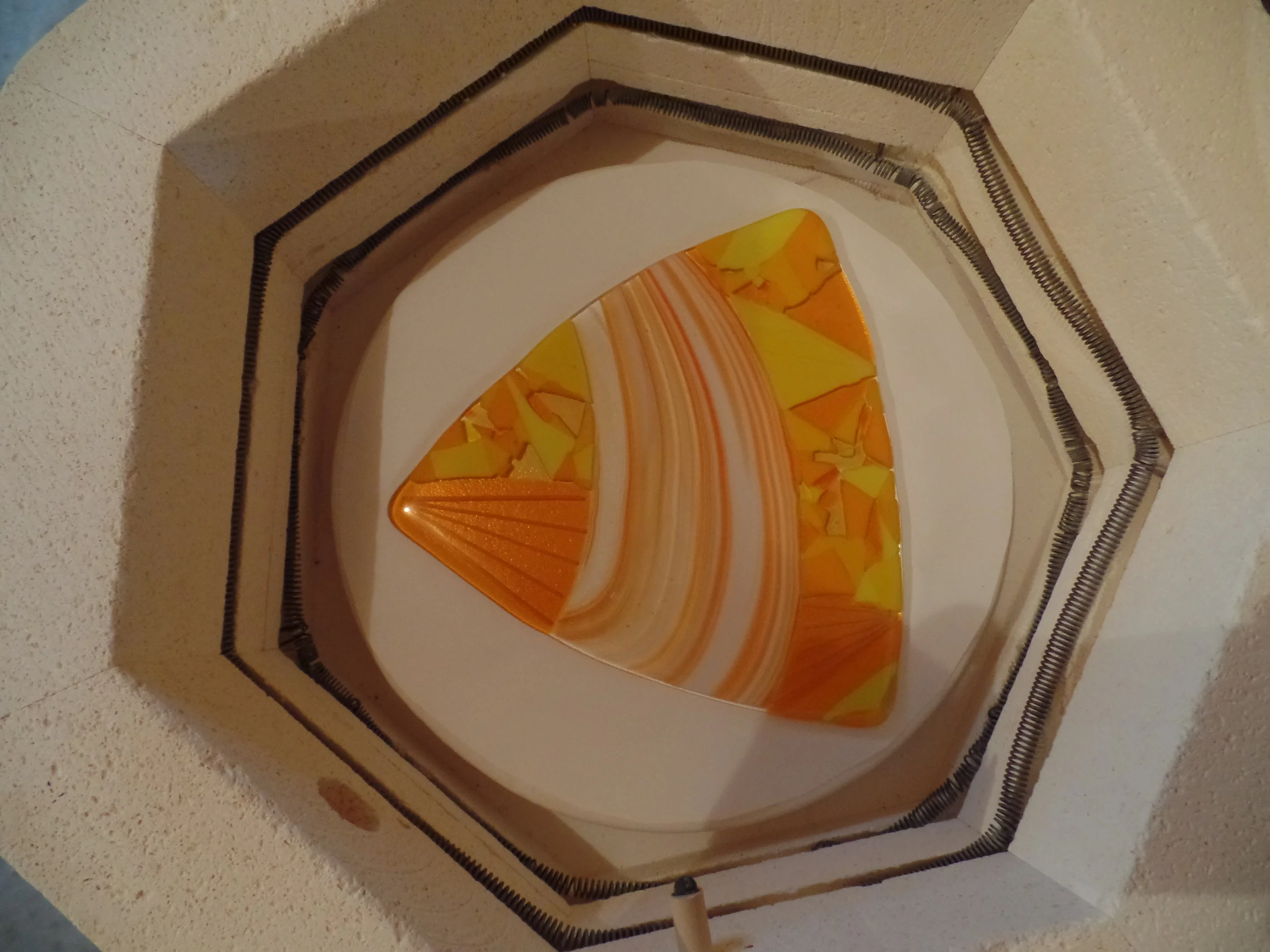 Triangle shape fully fused in kiln. 