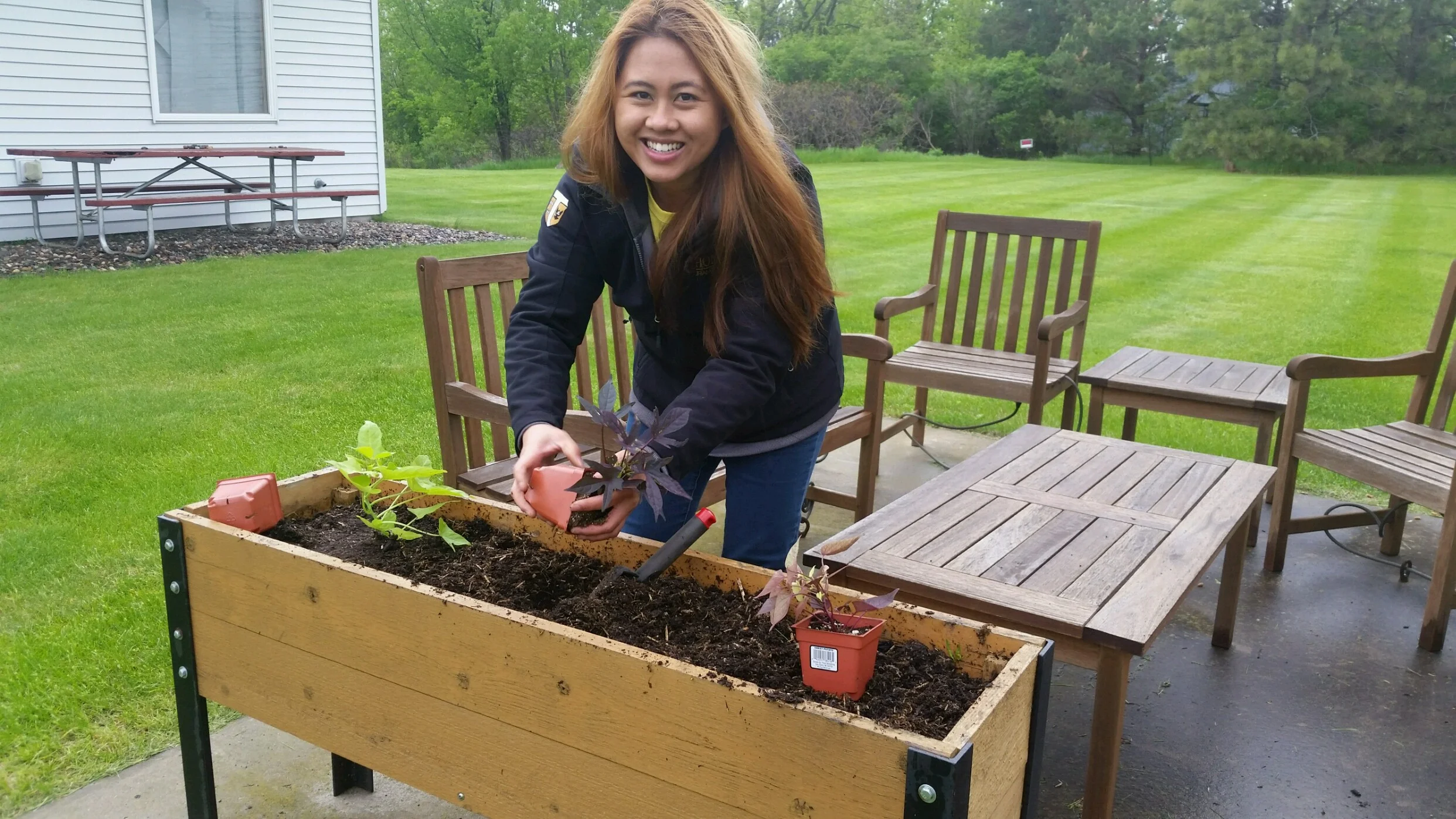 Alison Johnson Planting Flowers