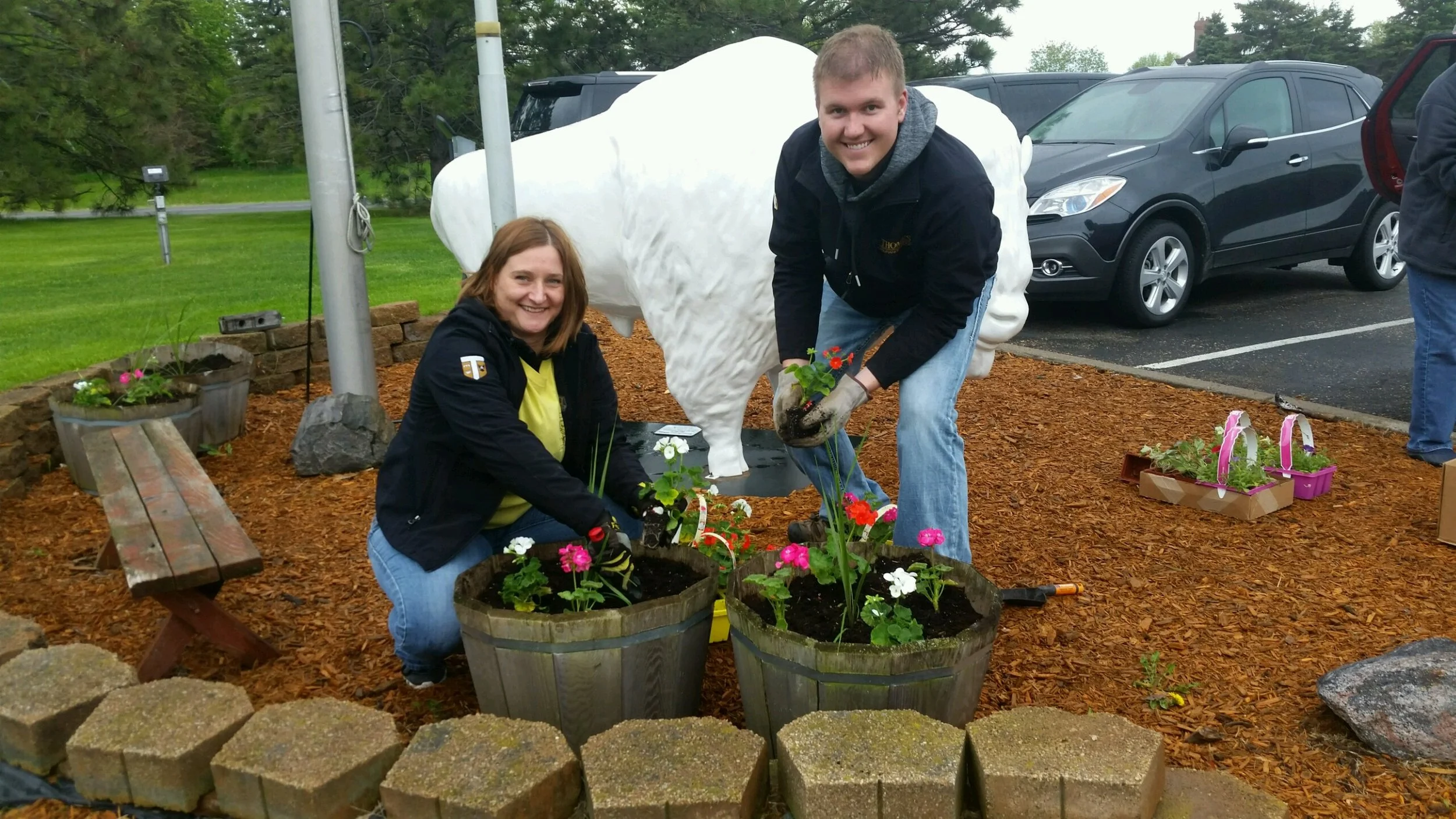Blake Miller & Tiffany Mulqueen Planting Flowers