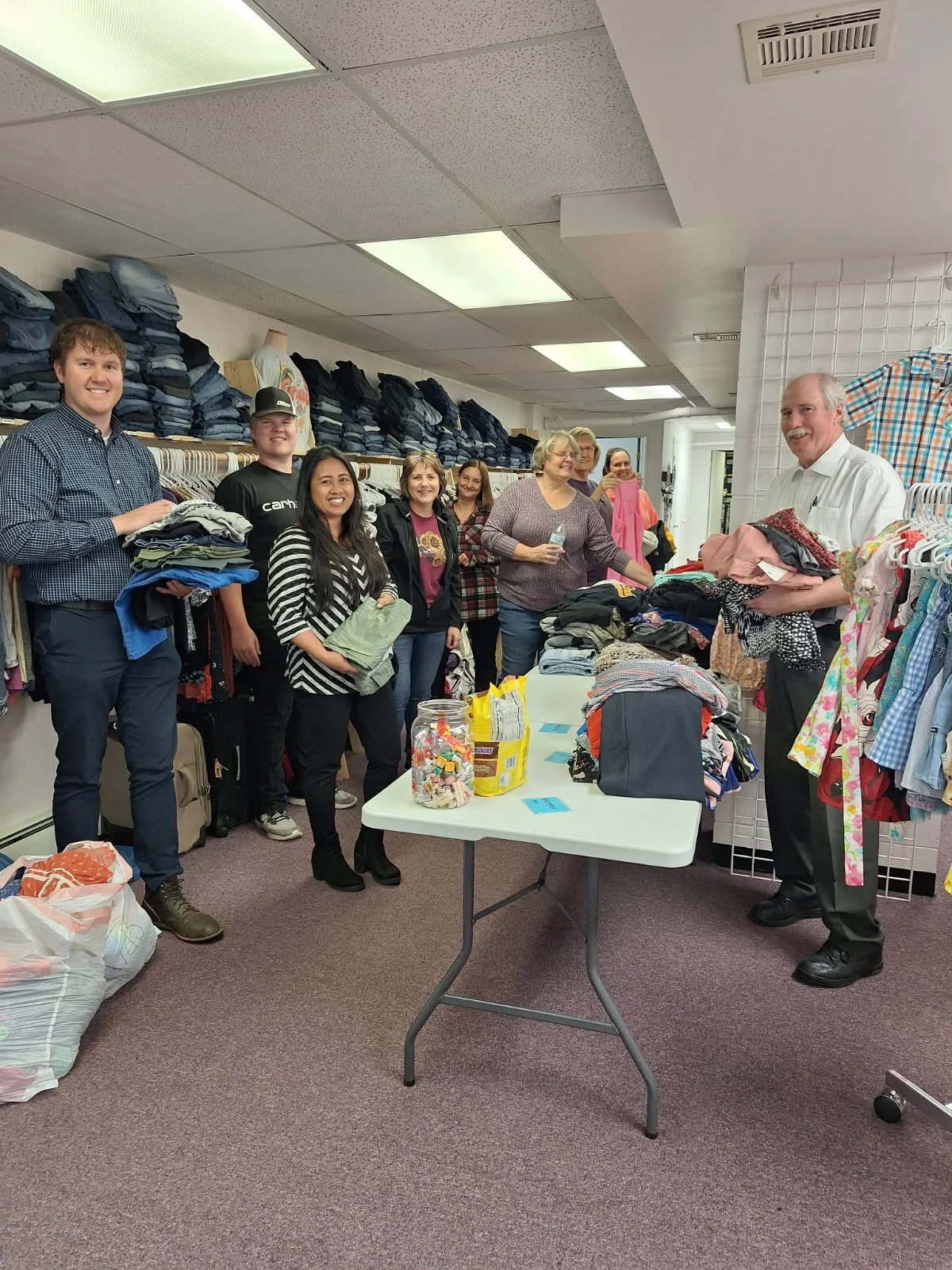 Sorting clothes at Wrapped In Love – May ’25