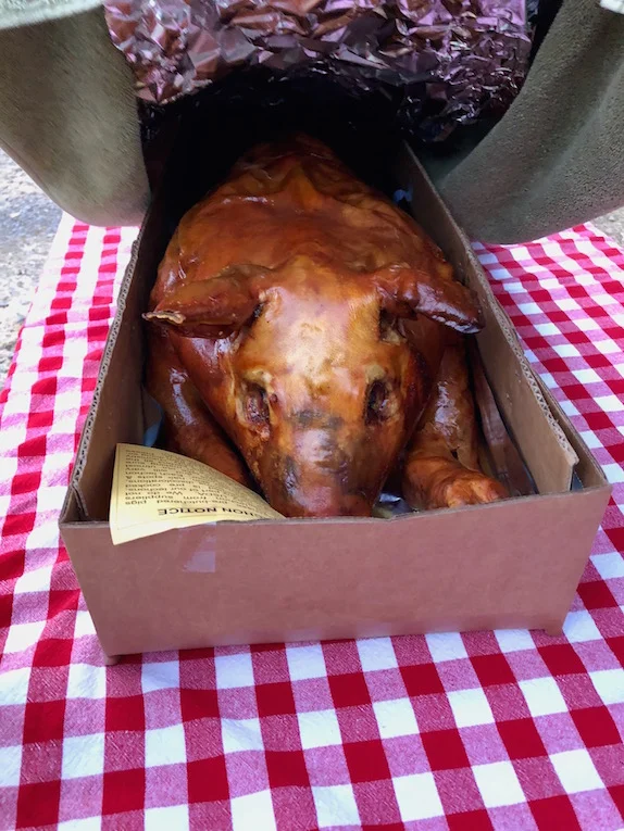 The pig, delivered to the house by Kalesa Restaurant.