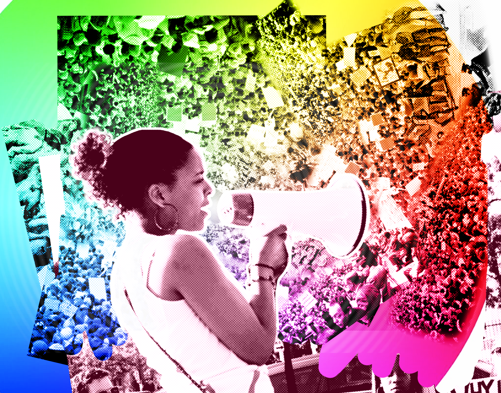 A woman speaks to a crowd through a megaphone.