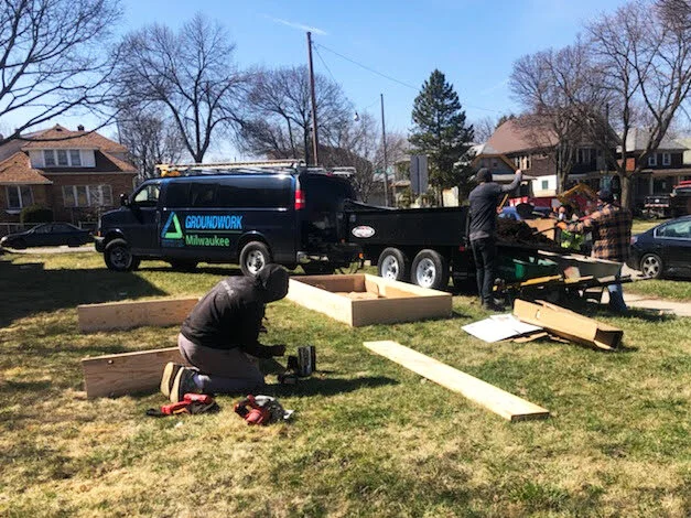  Ground Corps members constructing garden beds at the NIA Purpose Garden which just started this year! 