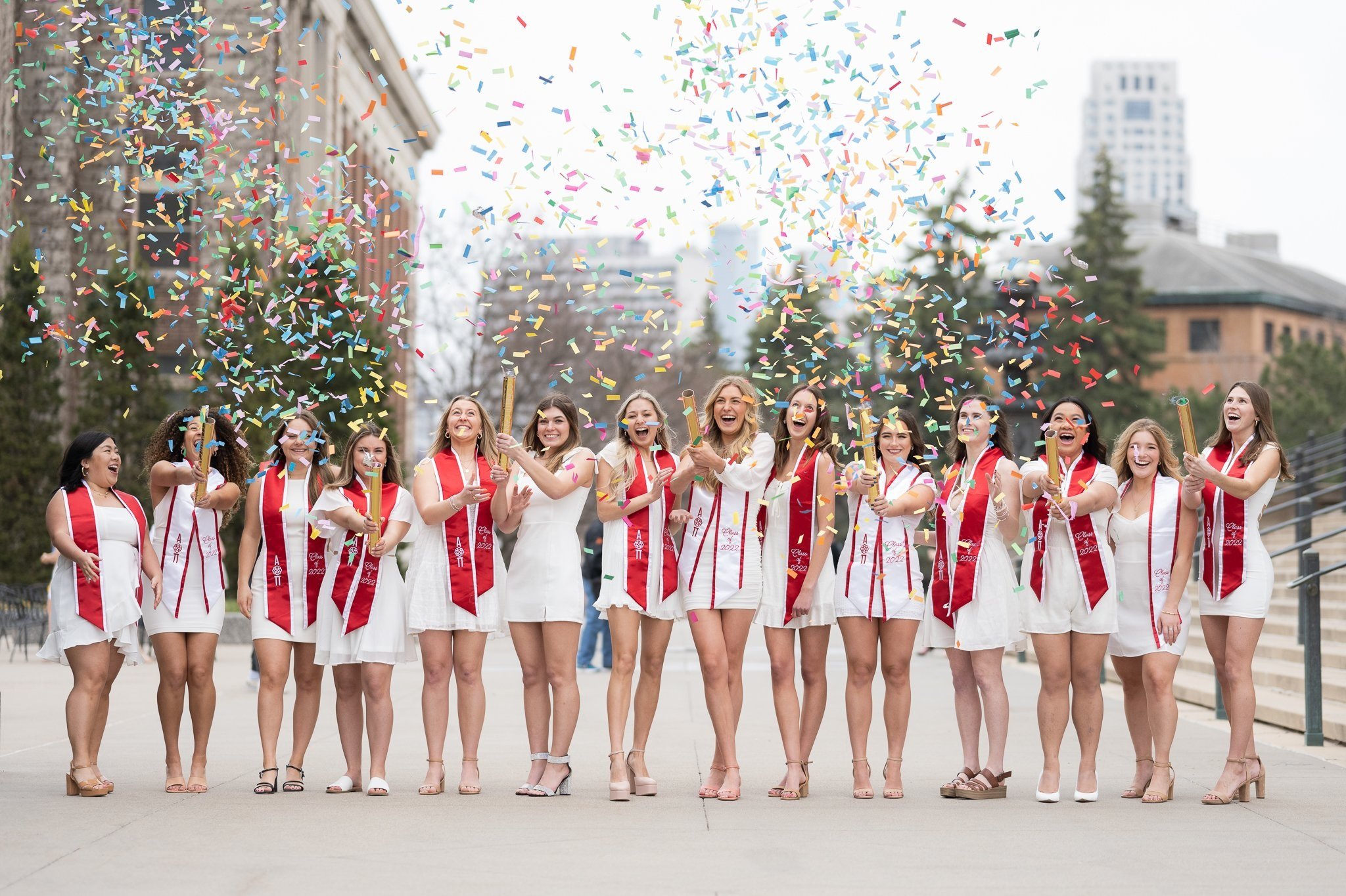 Large group sorority photography confetti campus white dress