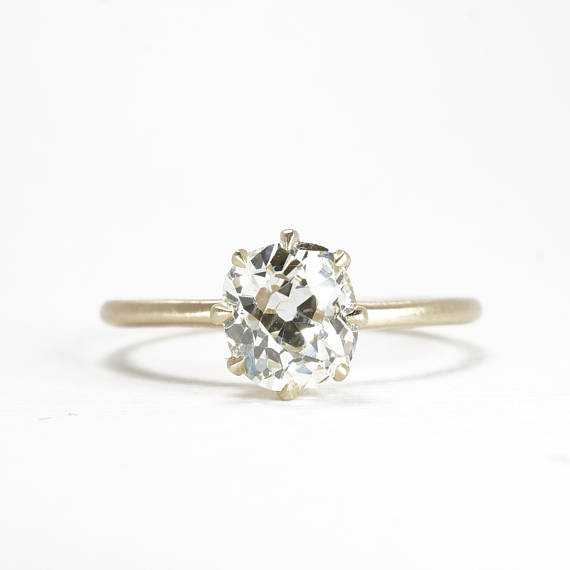 Antique cushion cut engagement ring in yellow gold matte finish