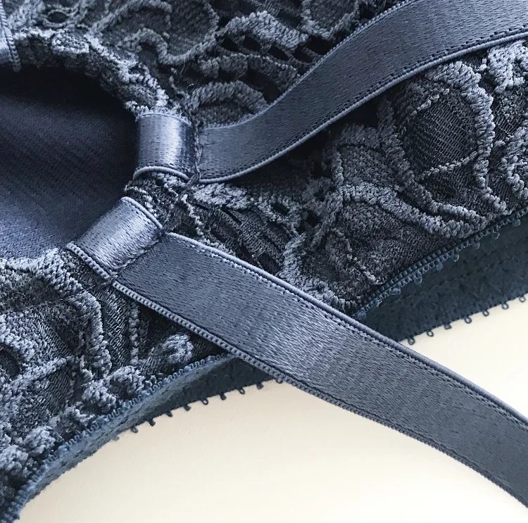 Close up of luna strap on harness o-ring and elastic