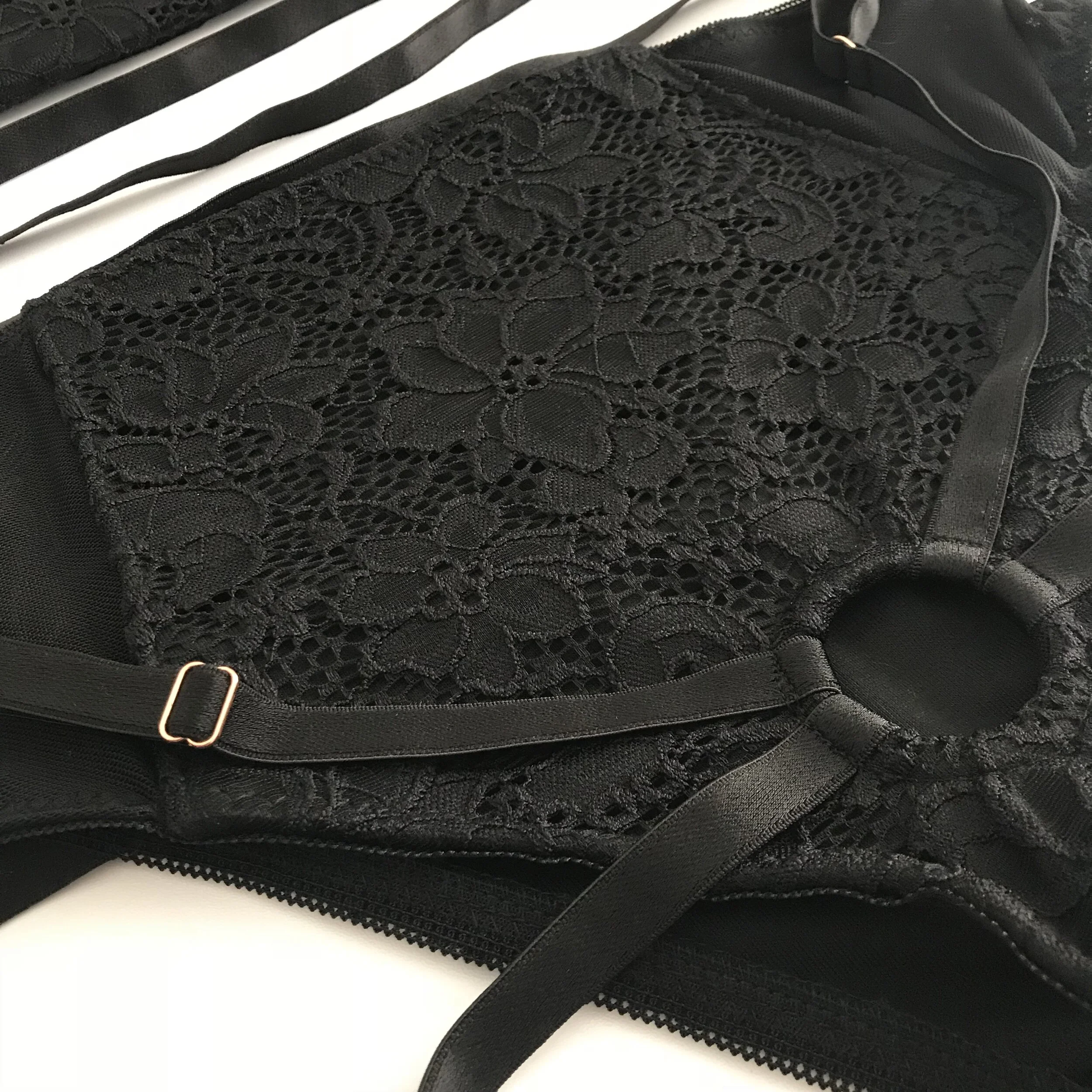 Black lace strap on harness flat lay (Copy)