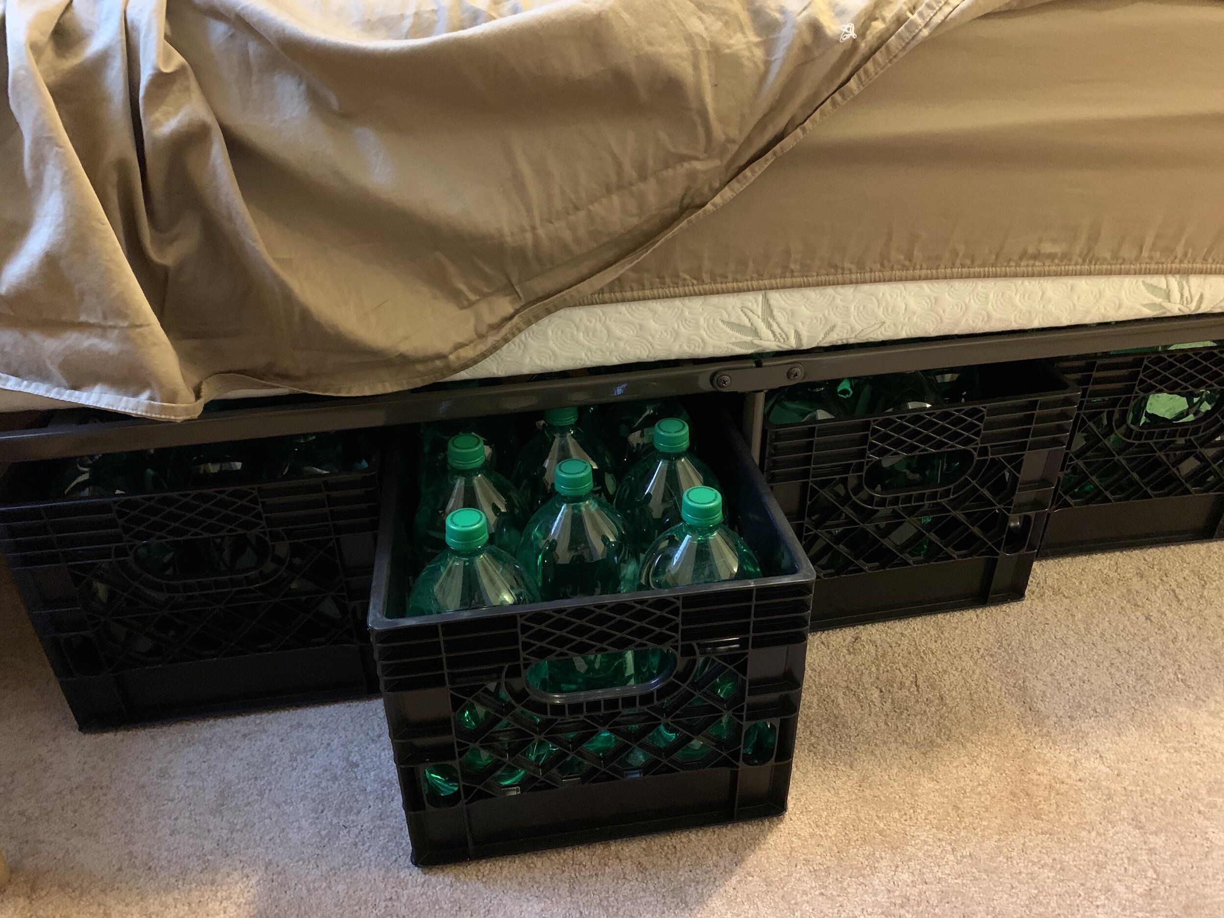 crates under bed.jpg