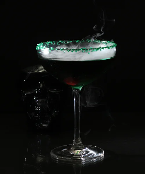 witchs brew martini with dry ice in glass.jpg