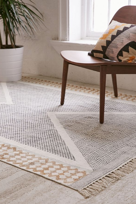 Is It Okay To Put An Area Rug On Carpet, Area Rug Pad Over Carpet